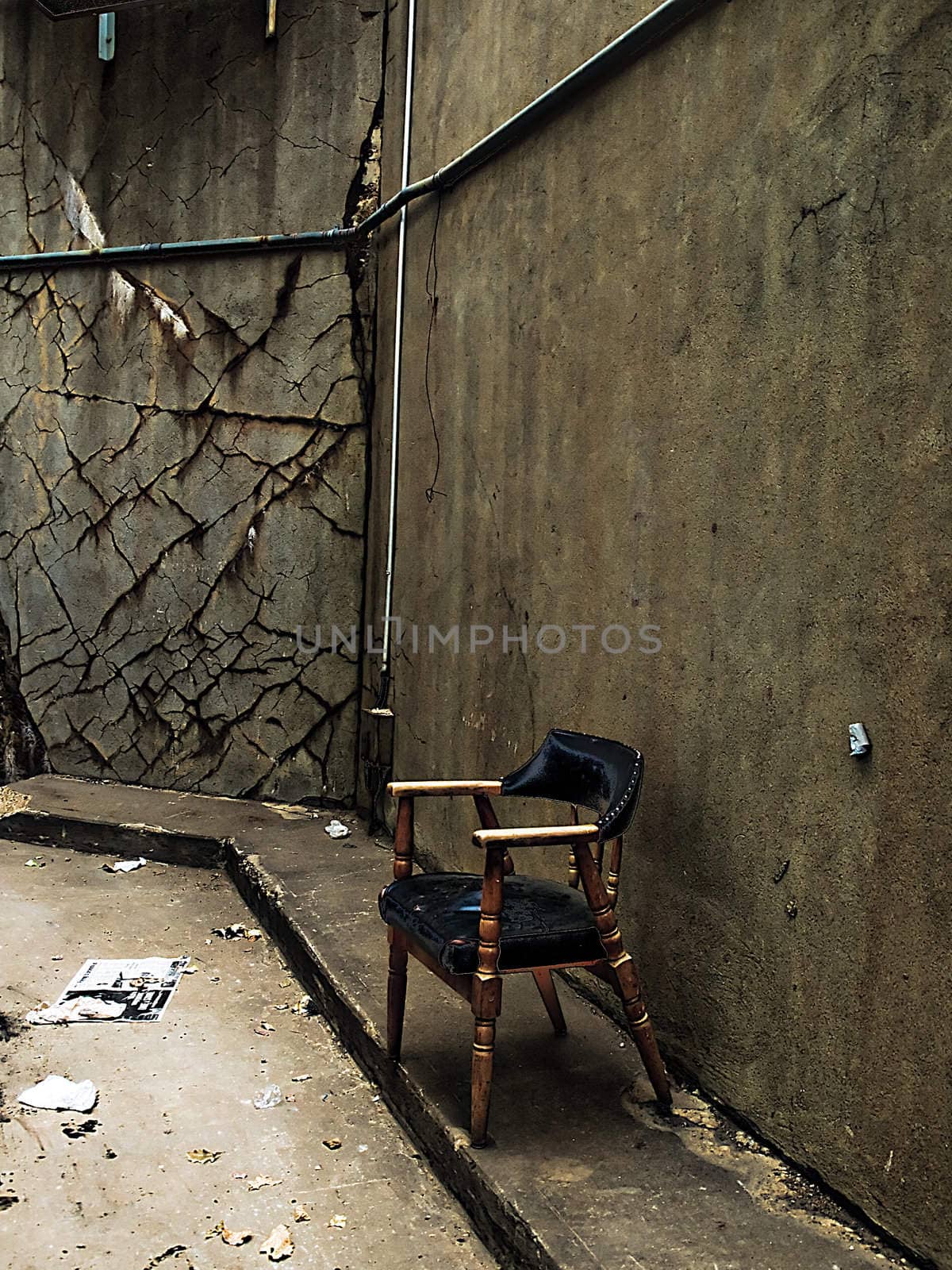 Lone chair in an abandoned building.