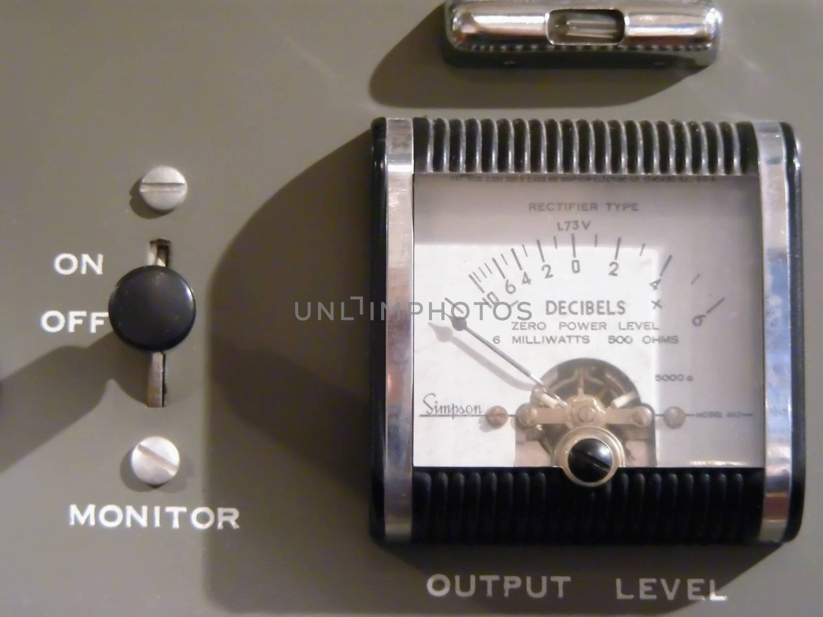 An antique intercom system control panel.