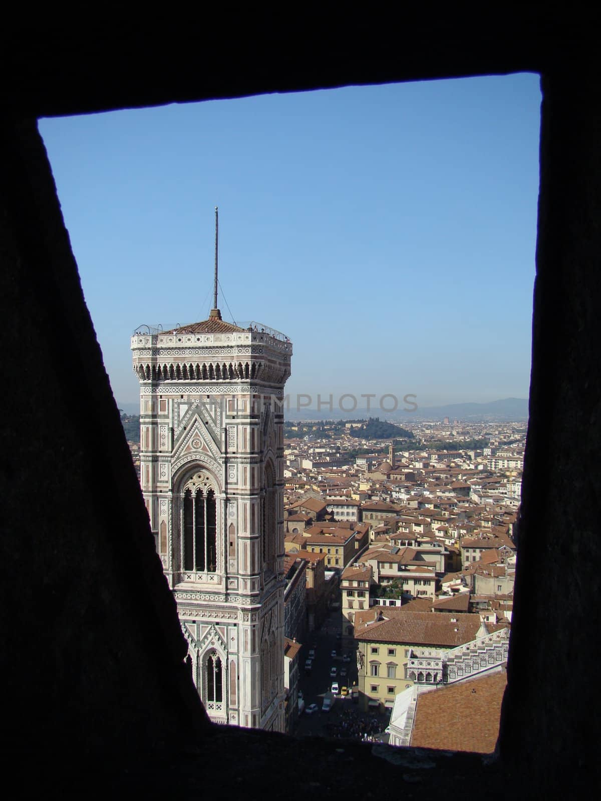 Campanile di Giotto in Florence seen from 
the cupola of the cathedral Santa Maria del Fiore, Tuscany, Italy.
