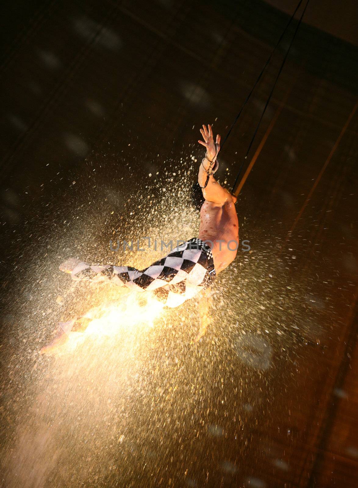 air acrobat carry out exercise on a circus