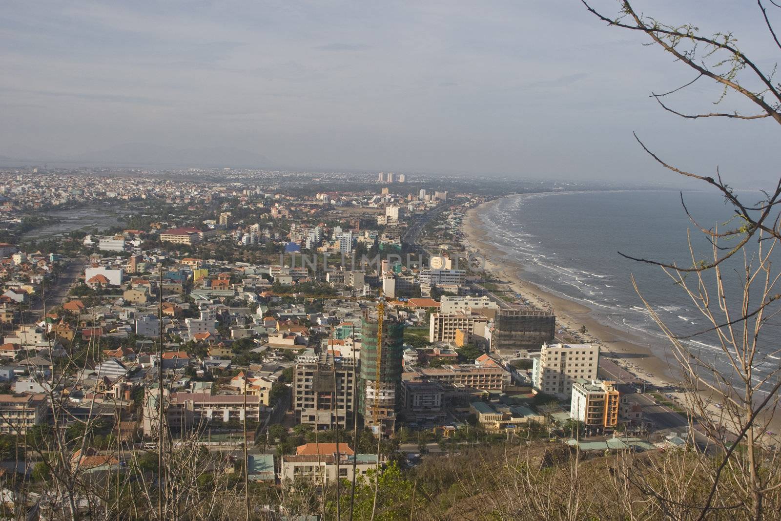 A view of the popular resort town of Vung Tau, Vietnam. With a beach stretching over 11 kilometers, and it's close proximity to Ho Chi Minh city, this area is packed with city people during the weekends. 