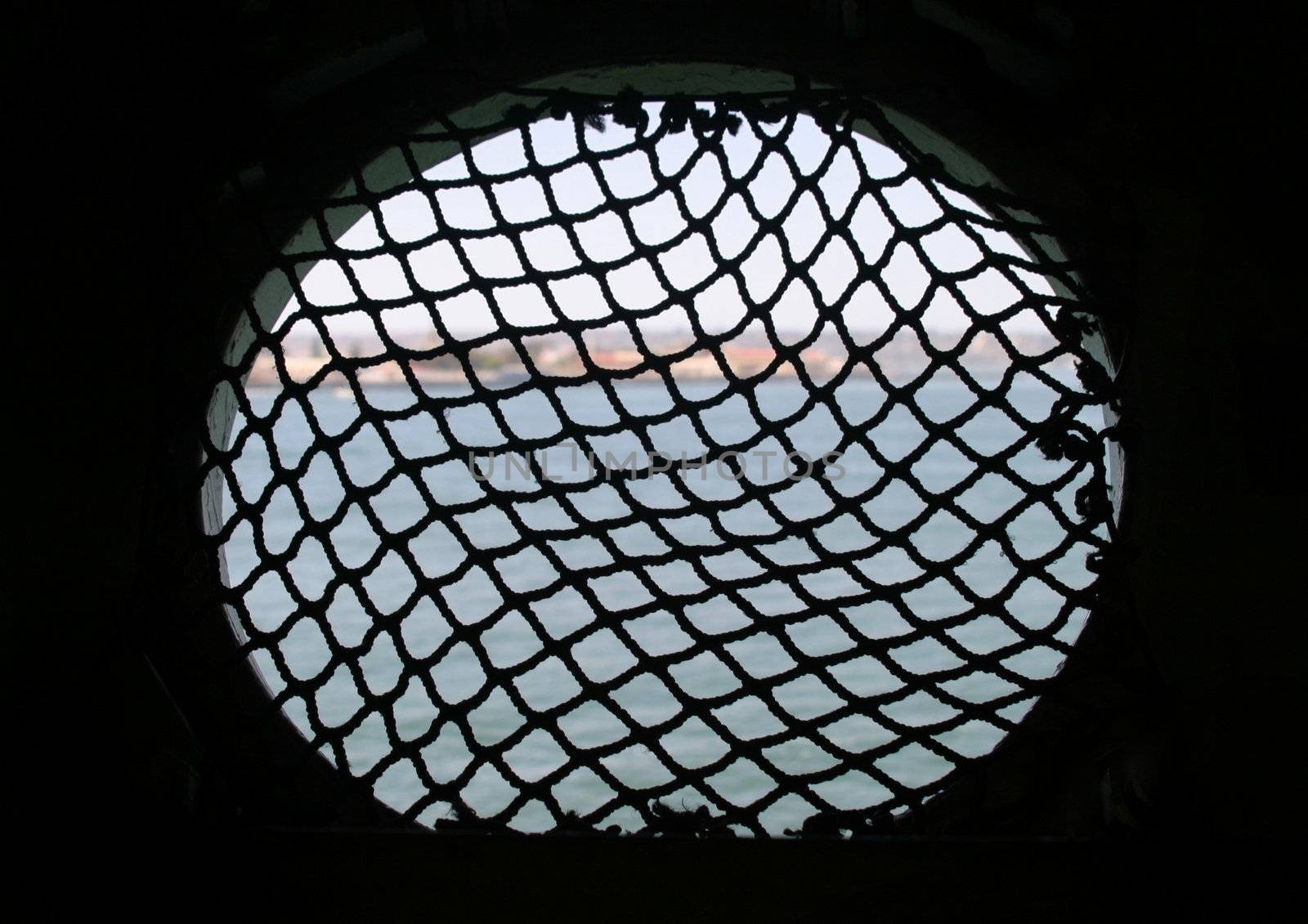 Looking out of a window on a ship.