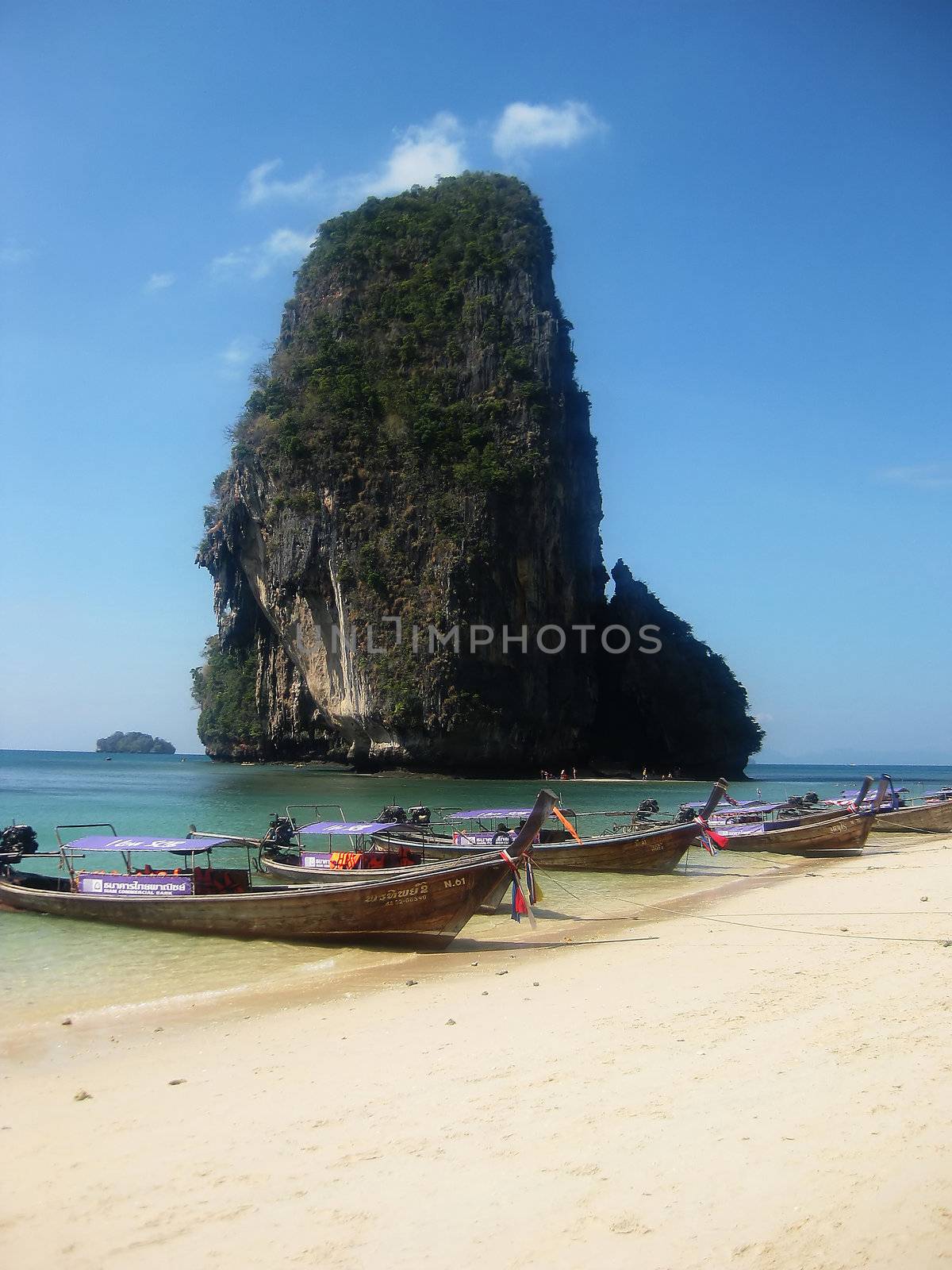 Phra Nang cave beach with longtail boats in Thailand