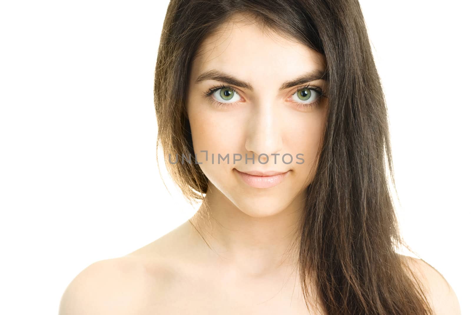 portrait of a beautiful young brunette woman isolated against white background