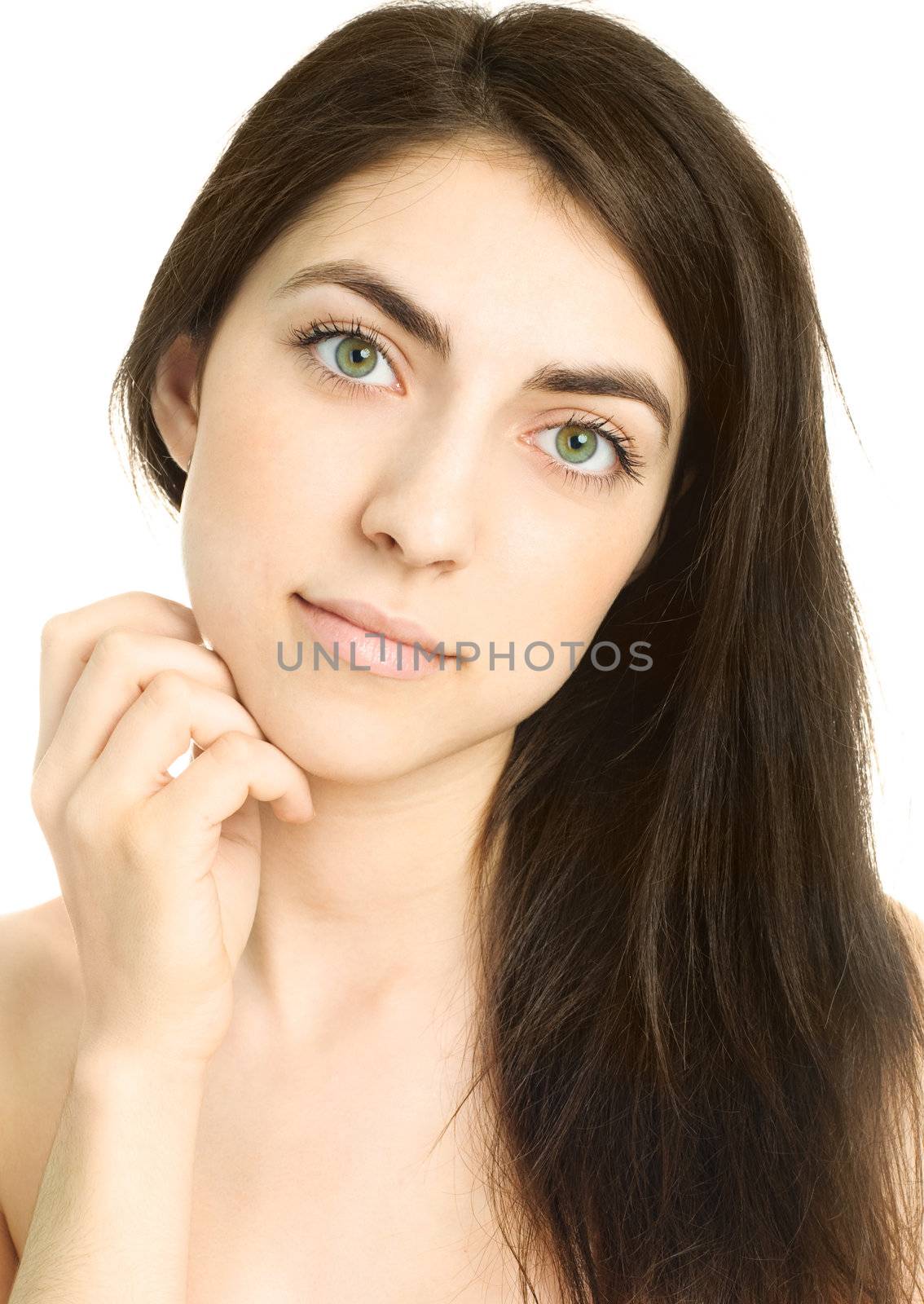 portrait of a beautiful young brunette woman against white background