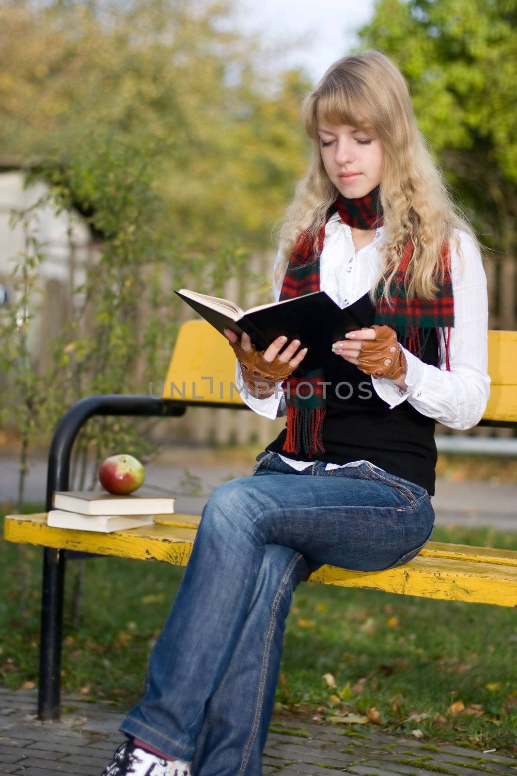 Student girl with a book by mihhailov