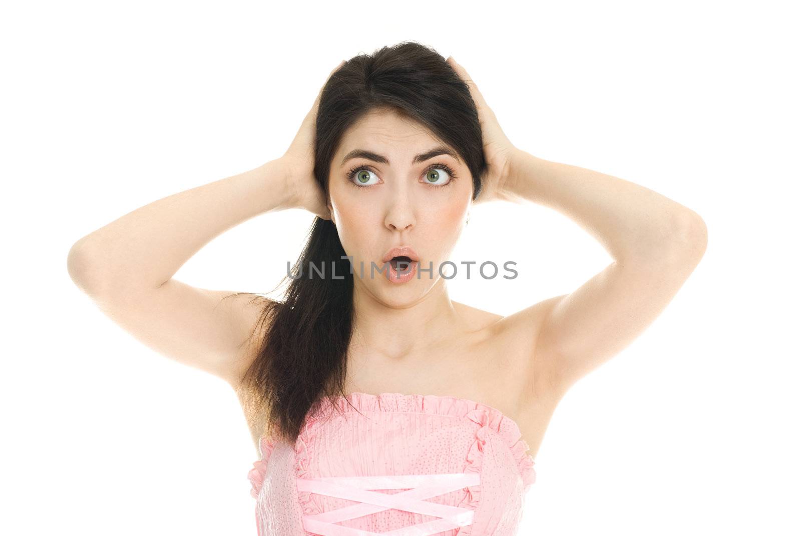 portrait of a beautiful surprised girl isolated against white background