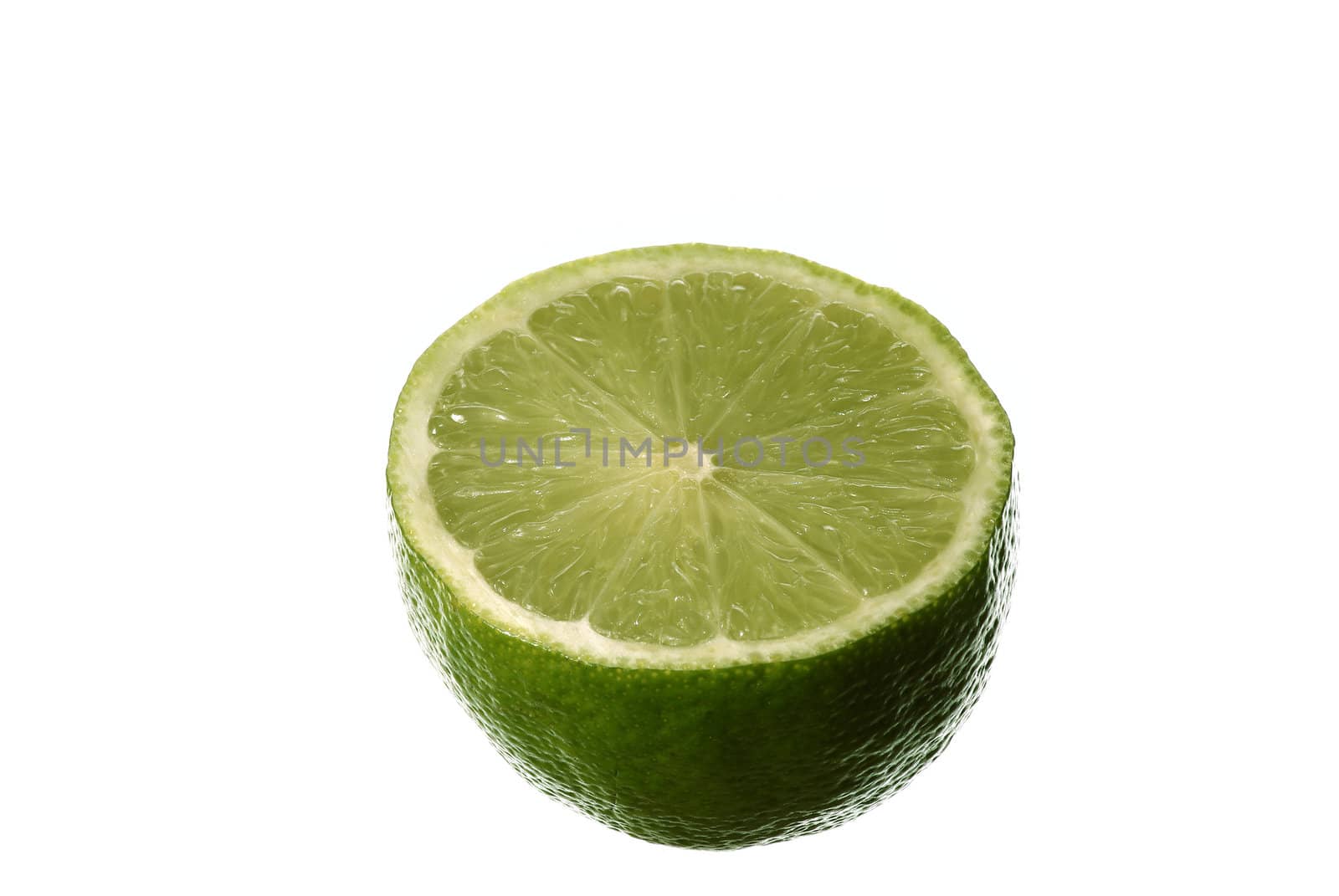 half a lime isolated on a white background