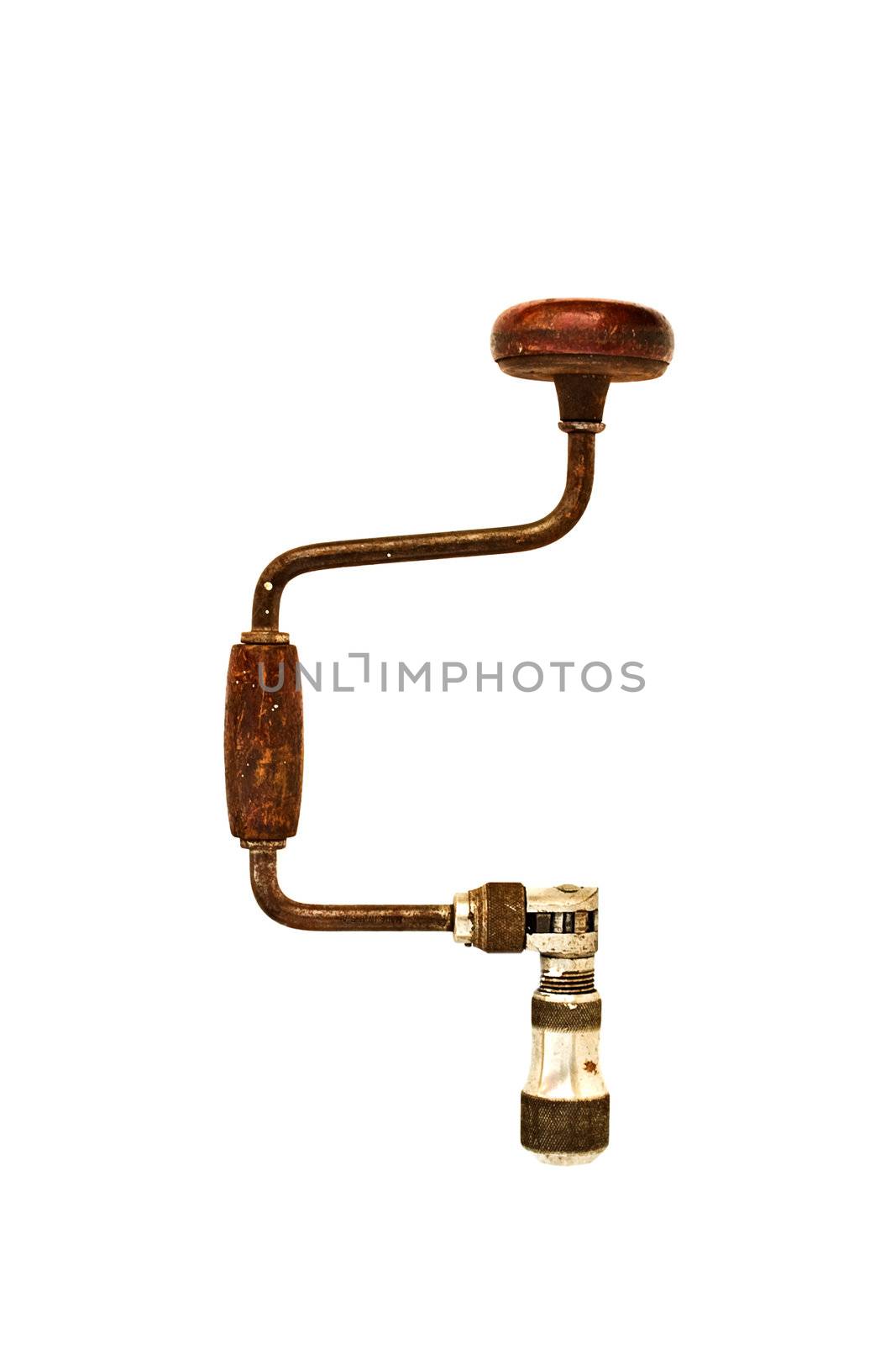 An antique wood drill brace isolated on a white background.
