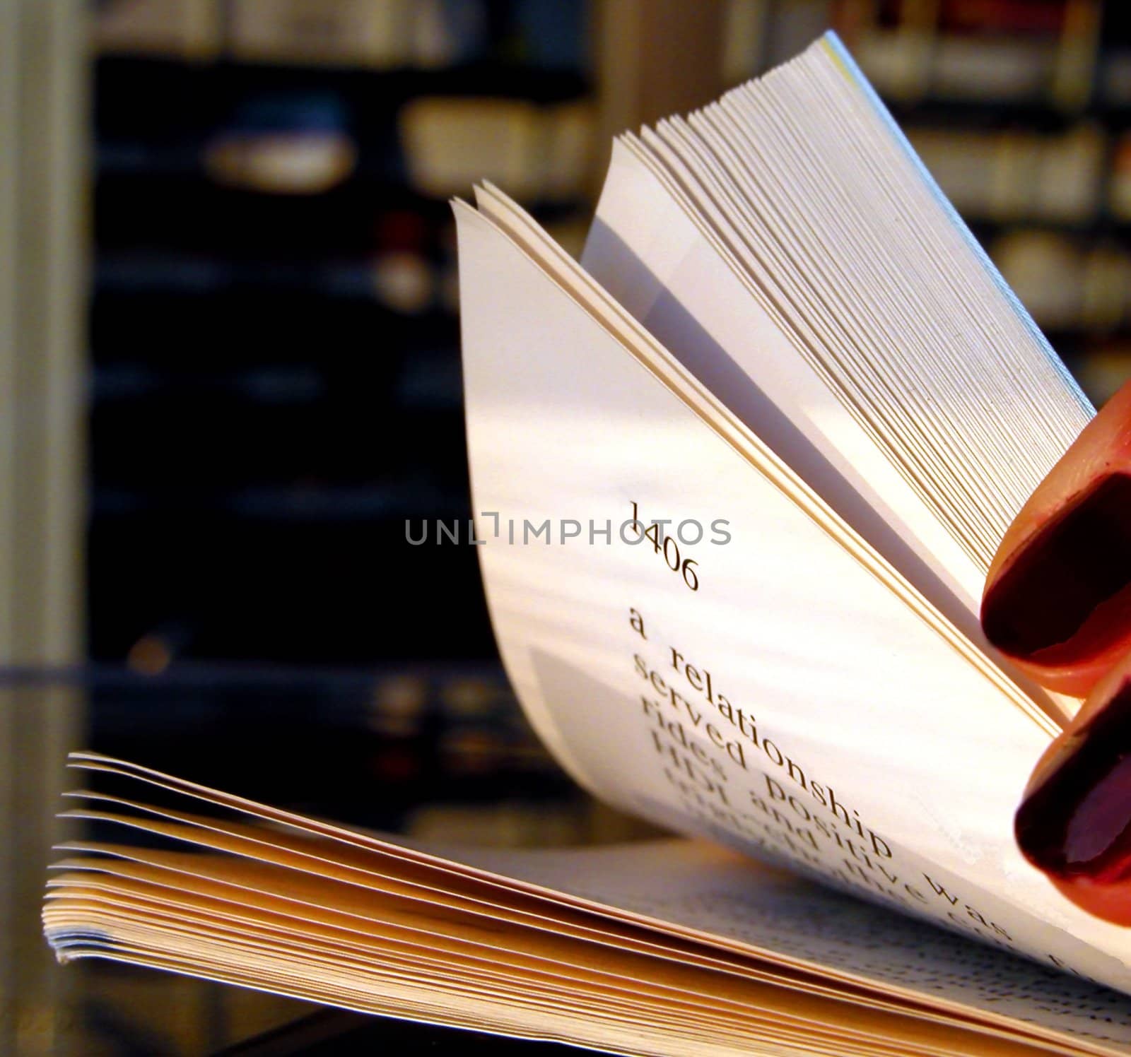 A girl riffling a scientific magazine          