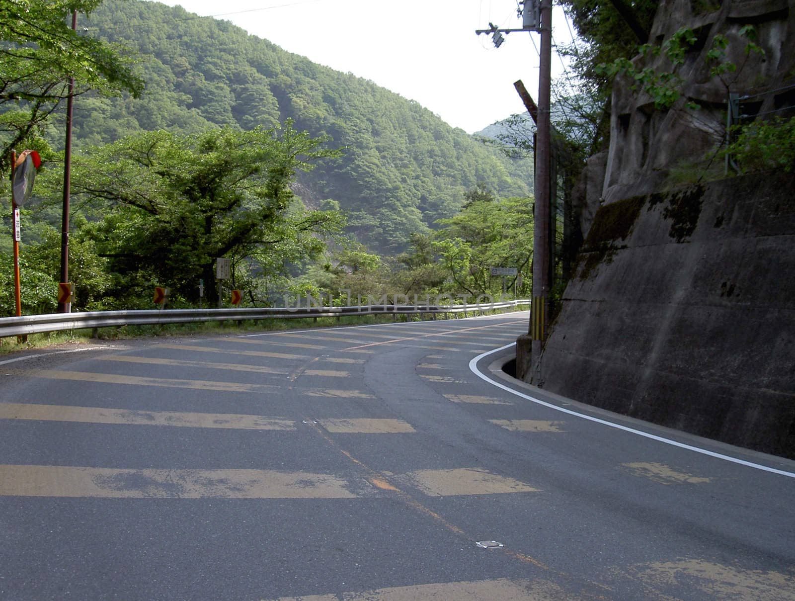 A road curve in Japan on the Uji riverside.