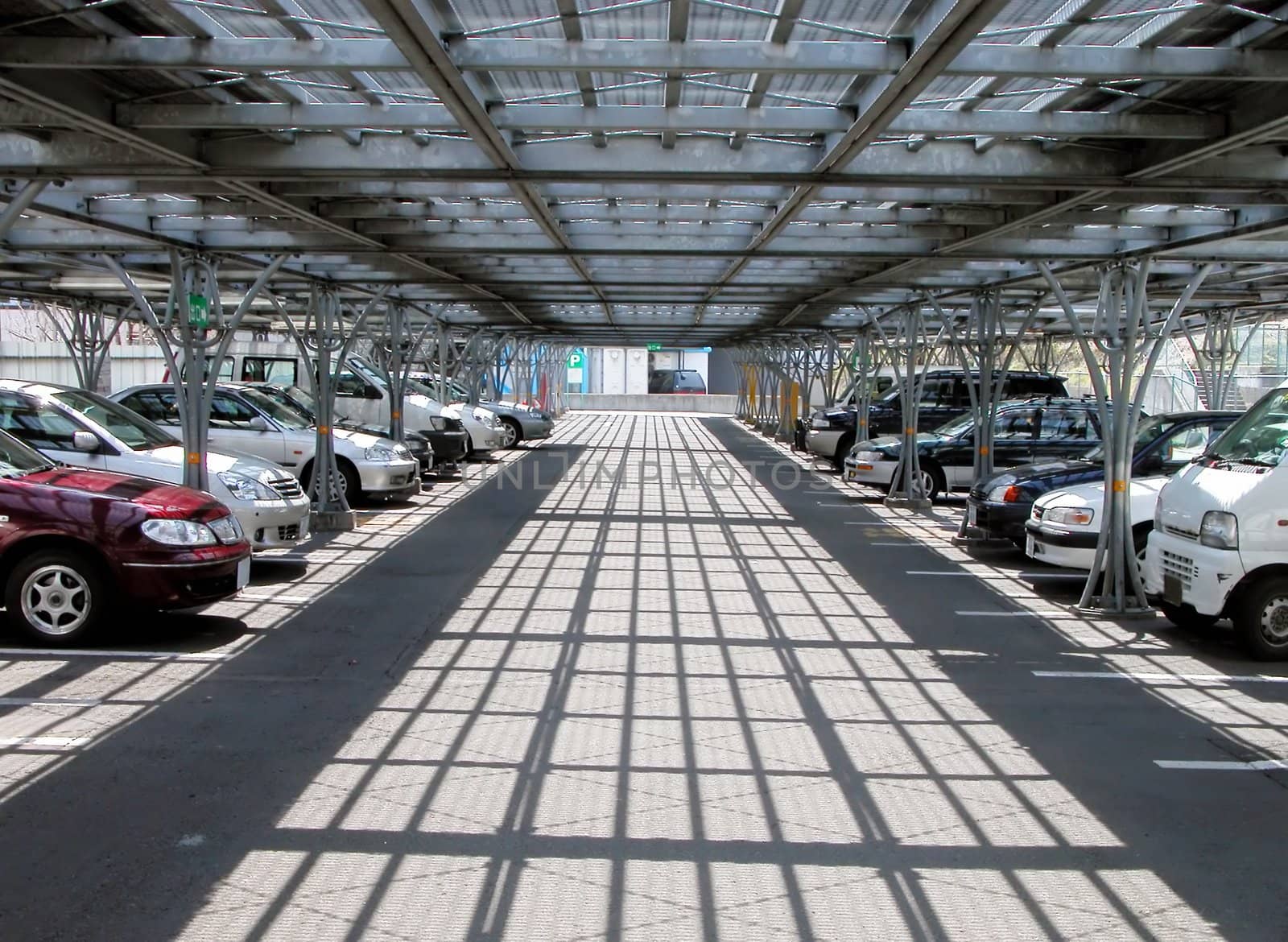 lights,shadows and perspective in a cars parking          