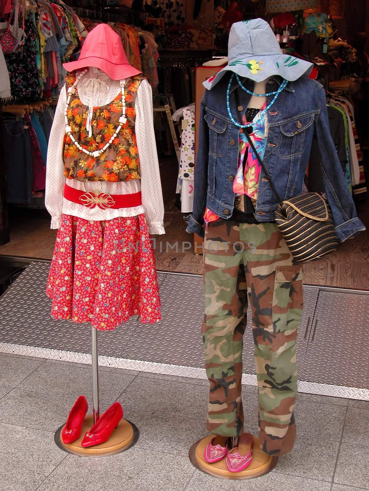 Two woman mannequins  in a front of a clothes shop in Japan        