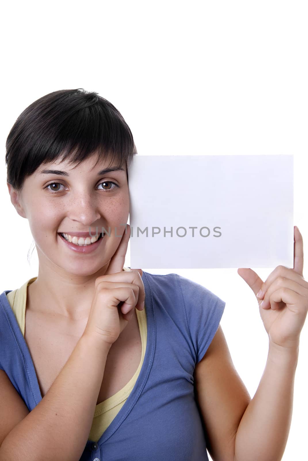 Young girl holding a card, close up