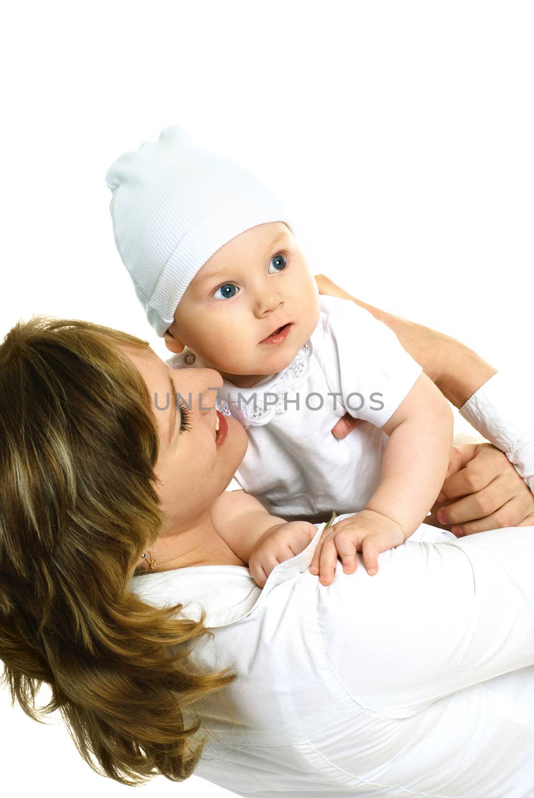 beautiful young mother holding her little baby, against white background