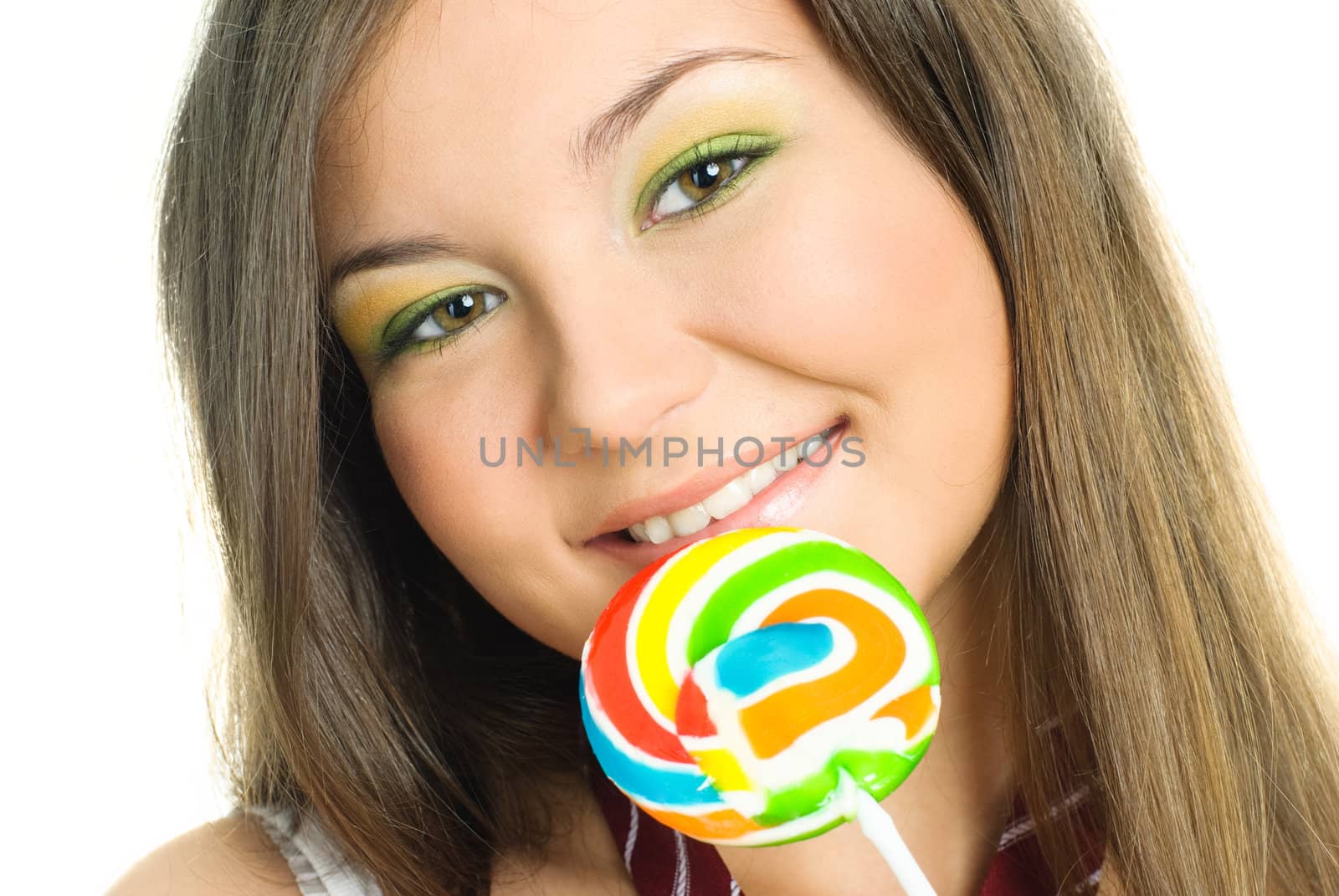 pretty girl eating a candy by lanak