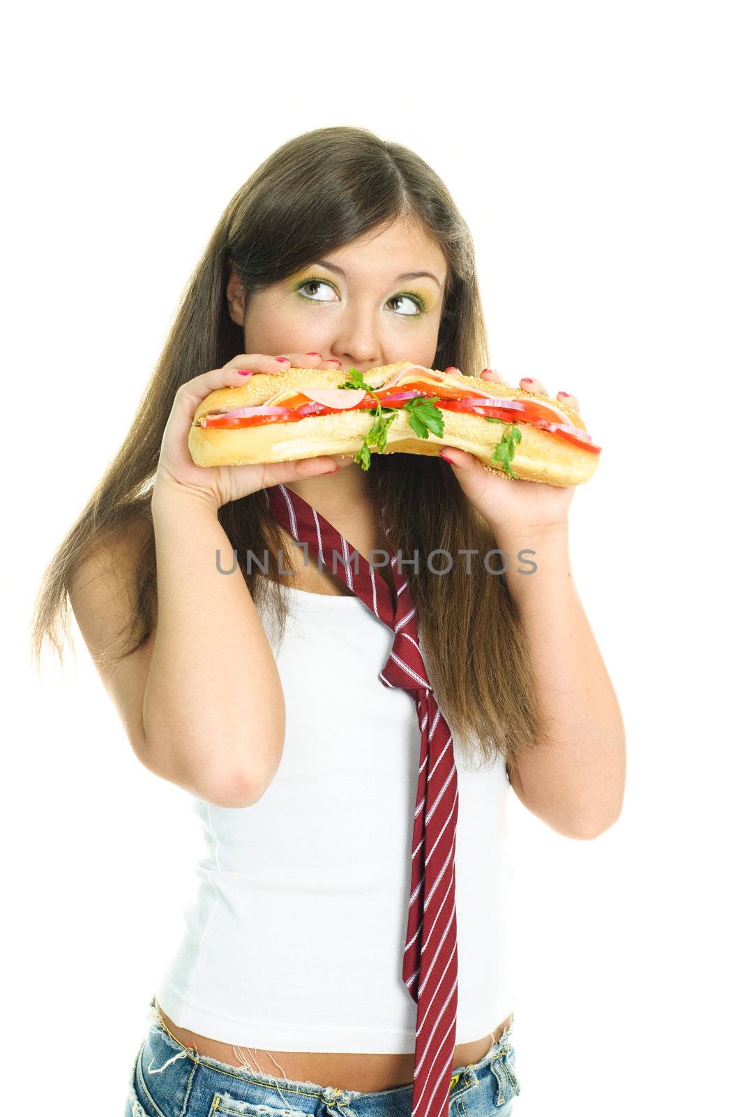 pretty young girl eating a huge sandwich, isolated against white background