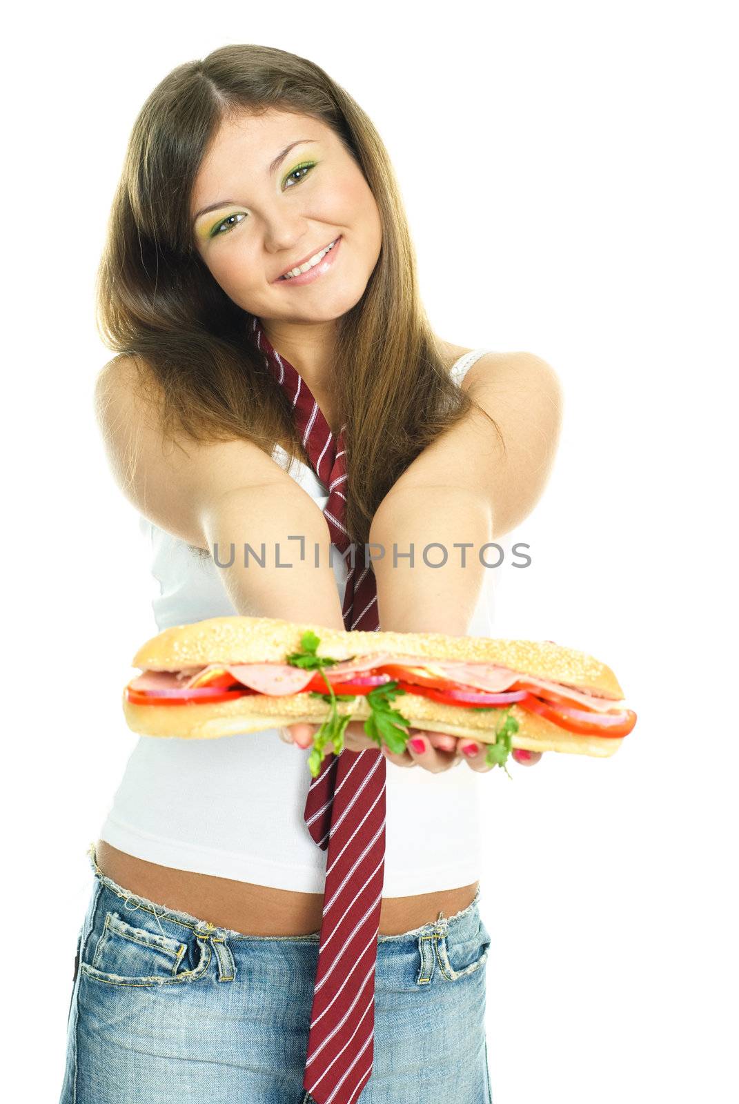 pretty young brunette woman giving us a huge sandwitch with a smile