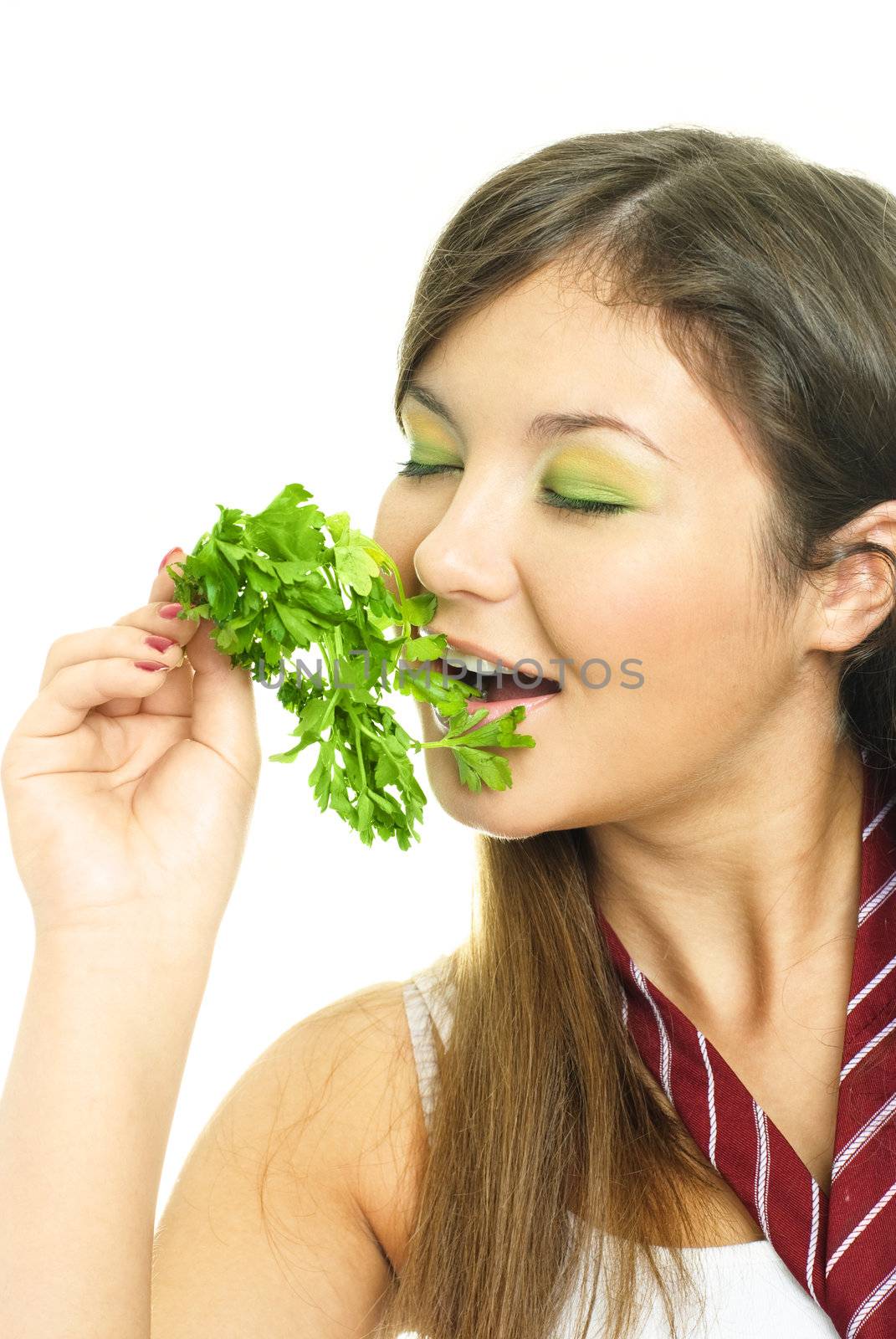 pretty girl eating parsley by lanak