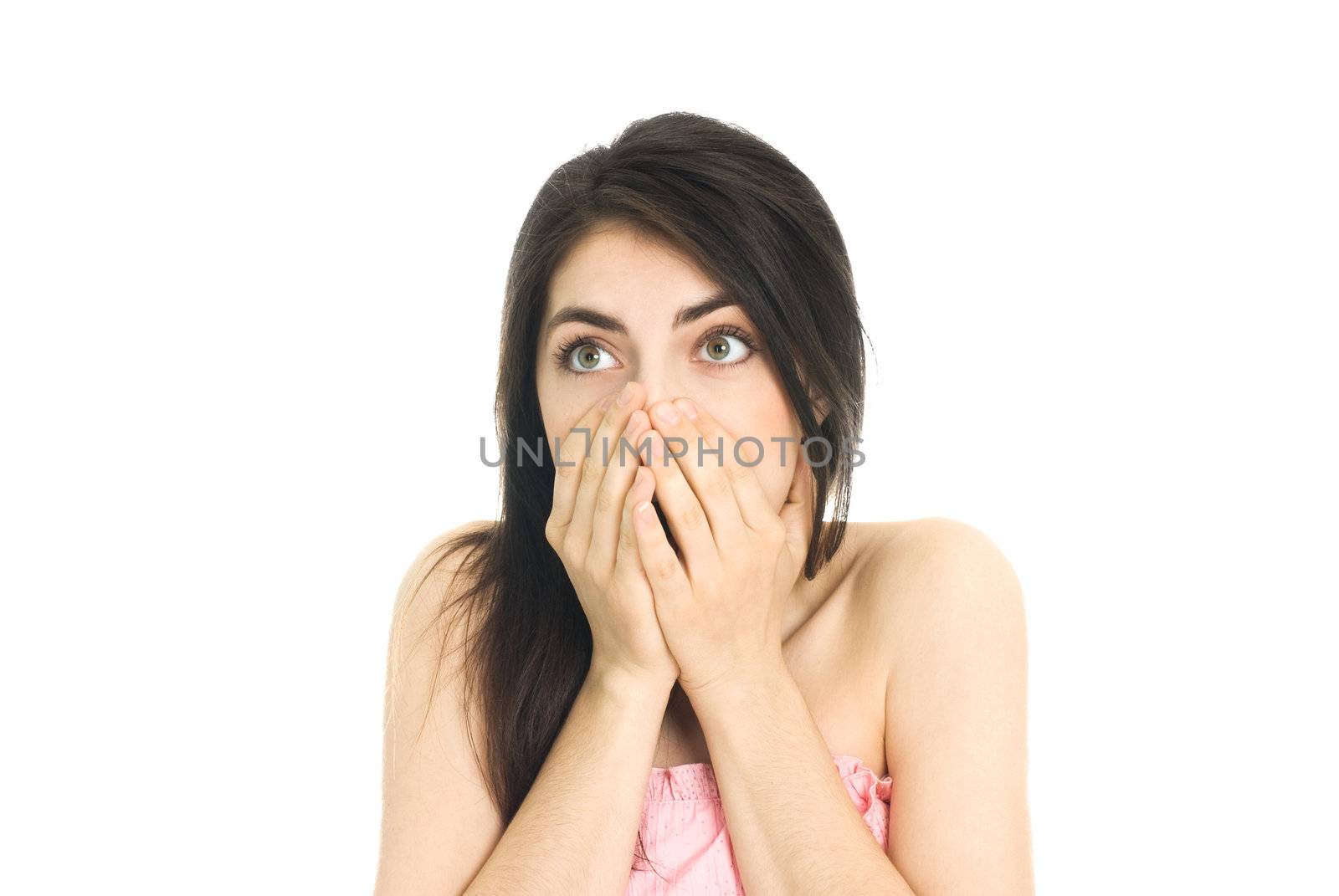 portrait of a beautiful shocked girl isolated against white background