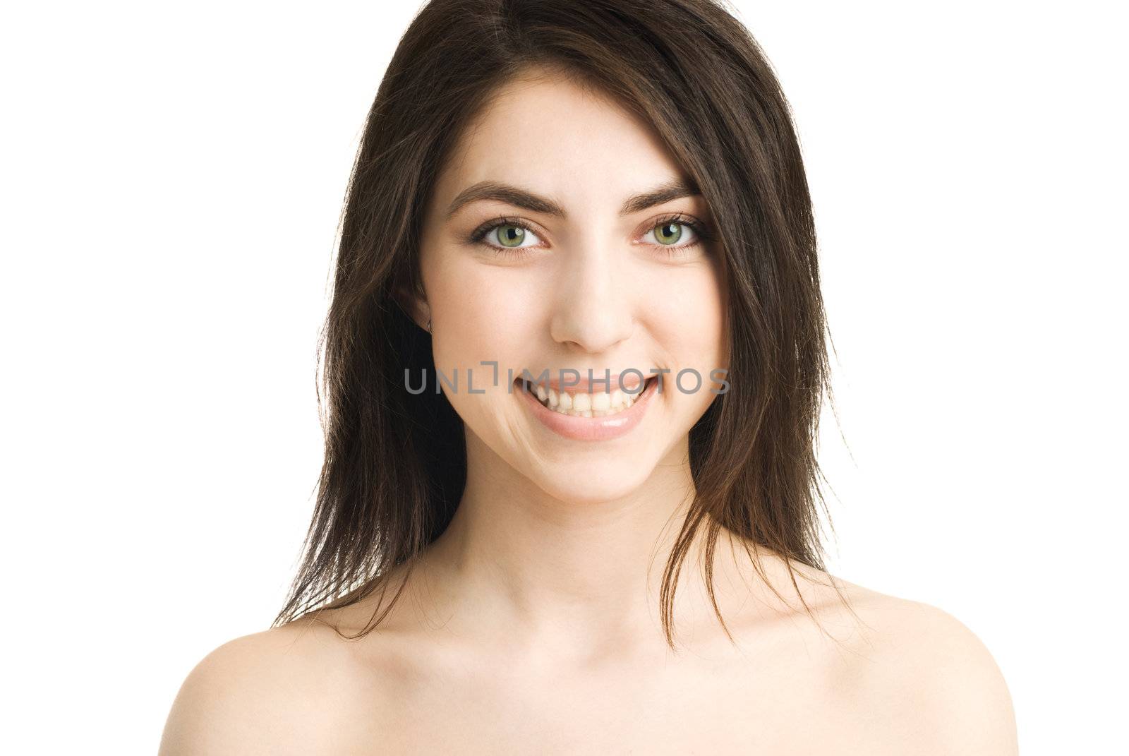 portrait of a beautiful happy brunette girl against white background