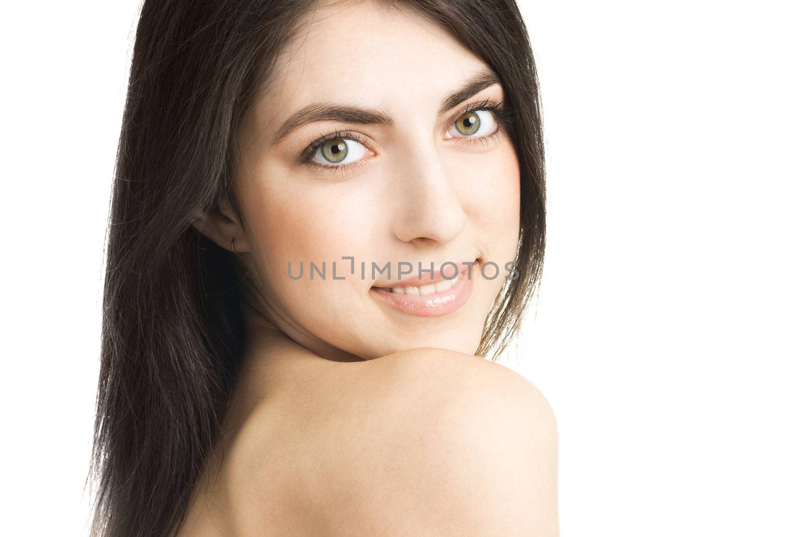 portrait of a beautiful happy brunette girl against white background