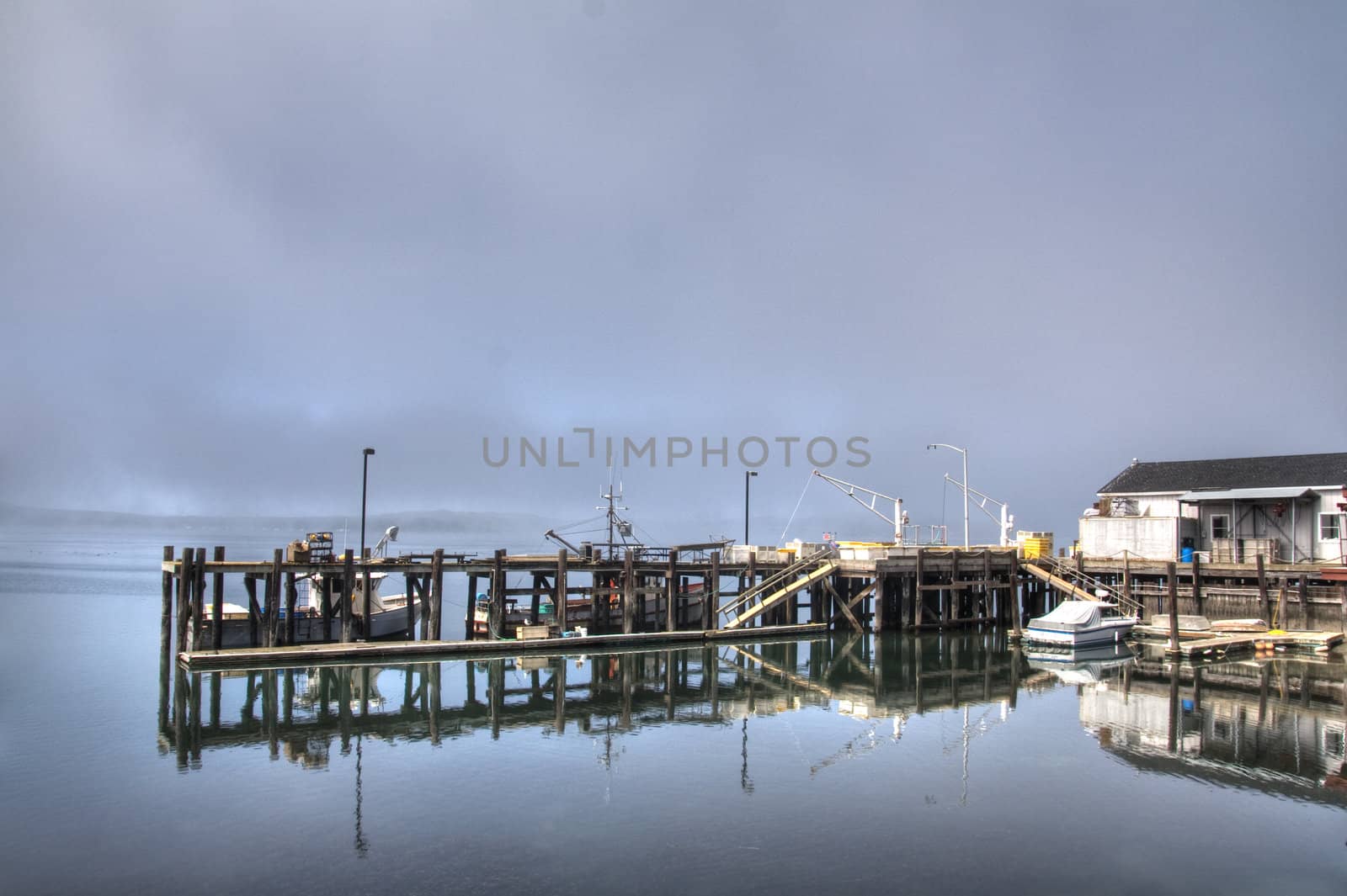 An early morning image of a wharf with frost