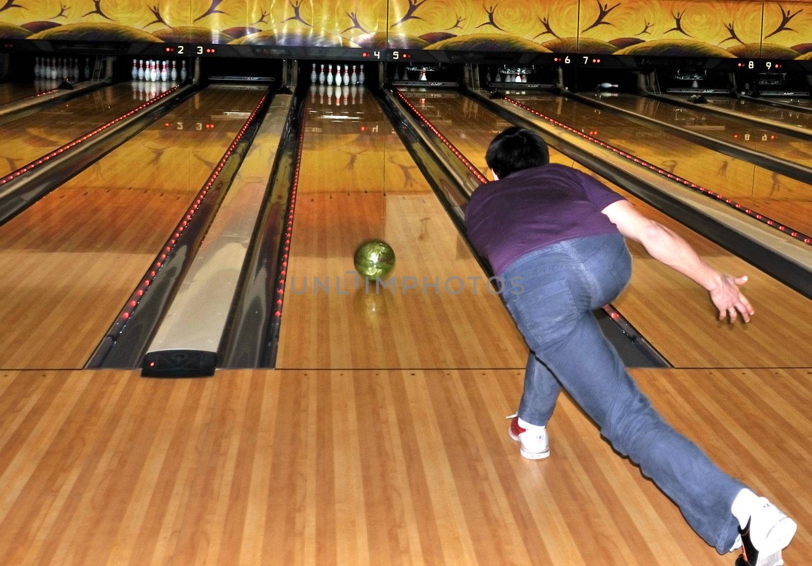 	
man plays bowling