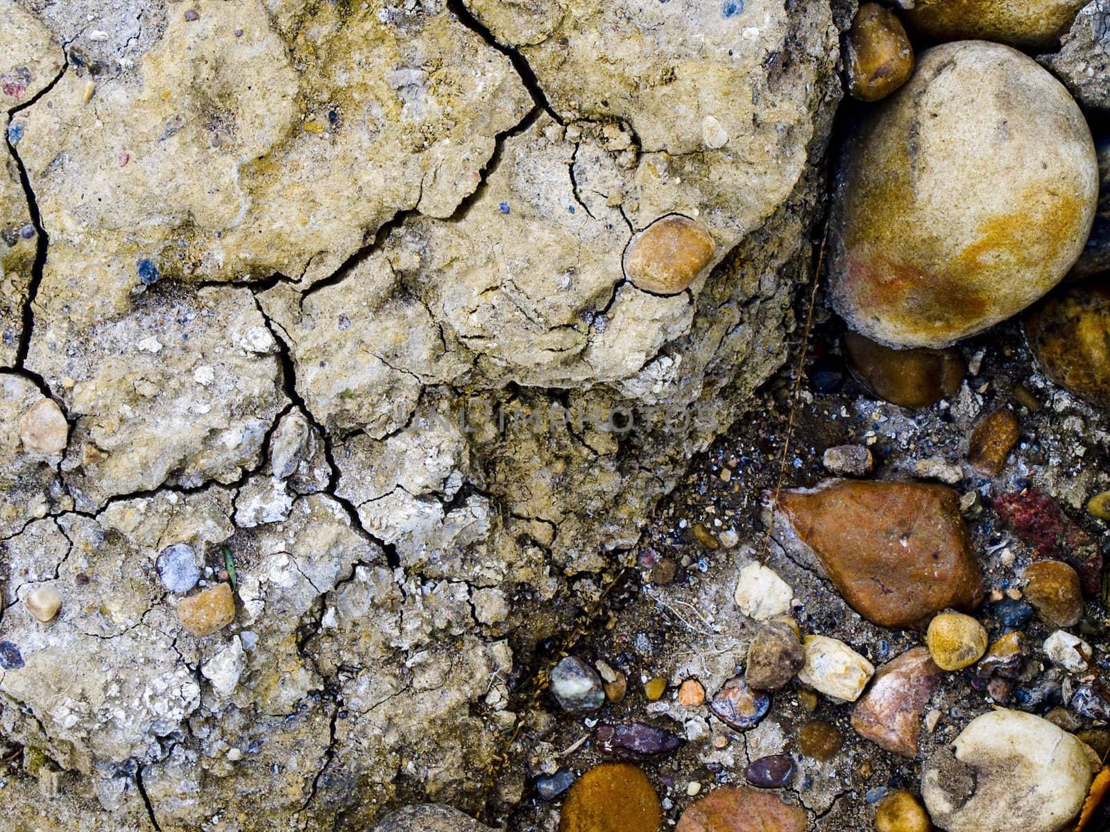 Rock and clay on a riverbank.