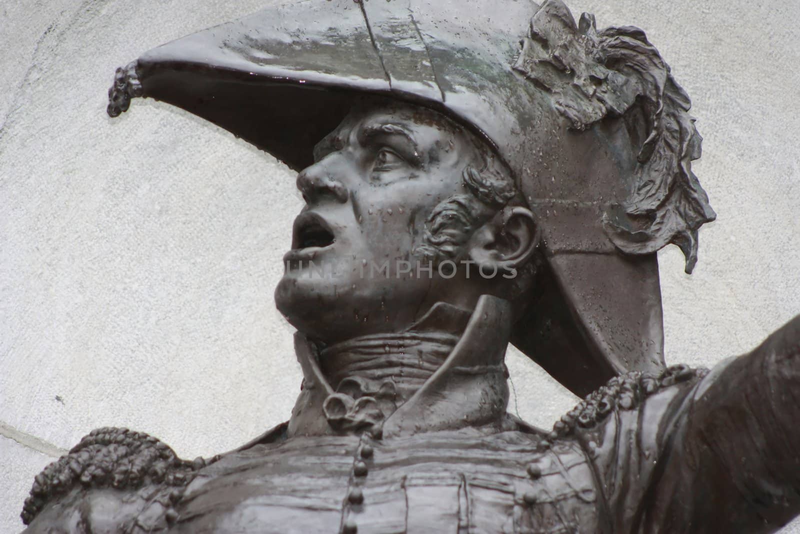 a statue depicting a commander, a man of power