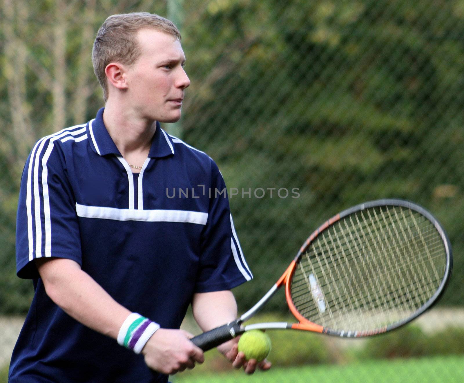 James ready to serve his game of tennis.