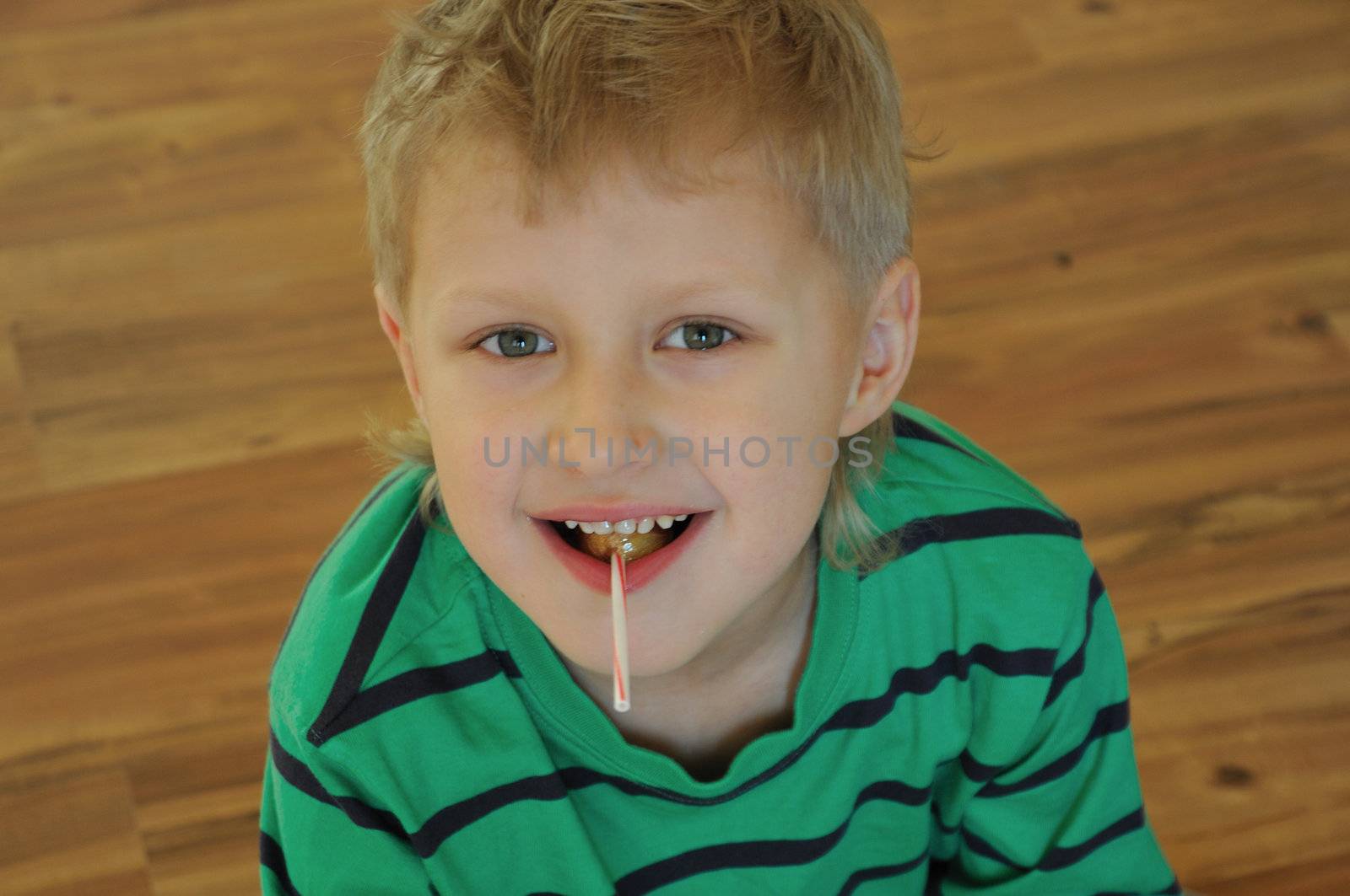 Boy With Lollipop by Reana