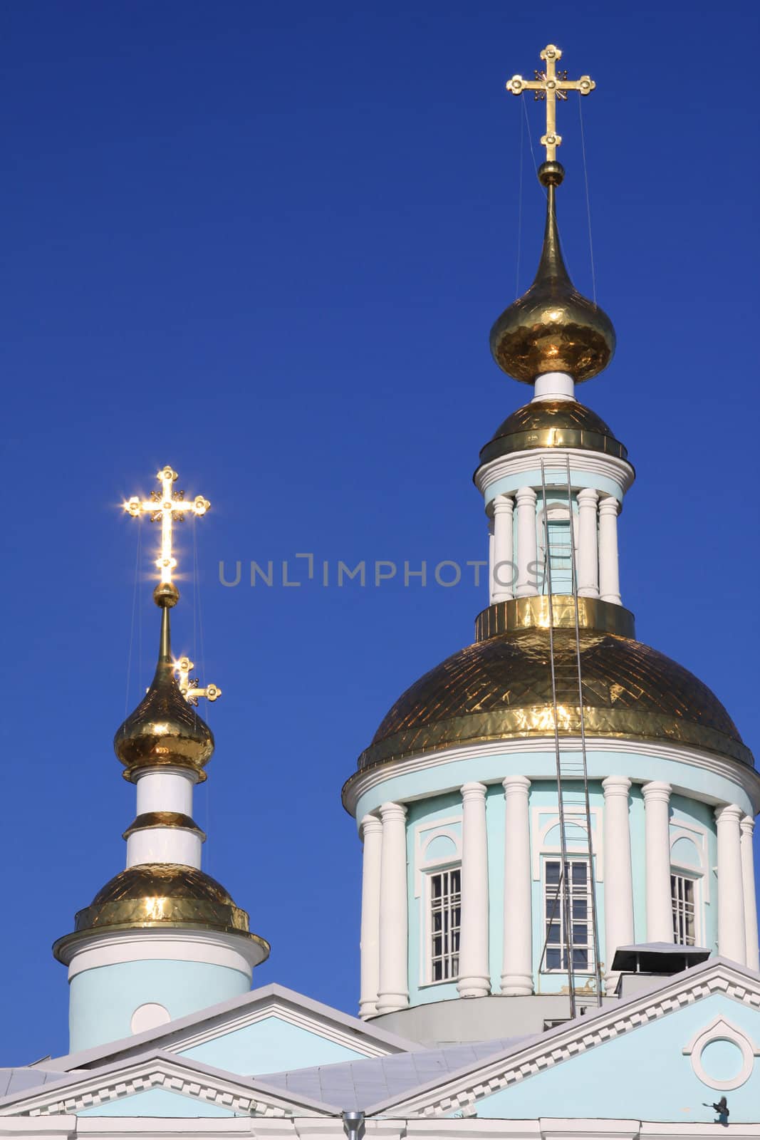Gold domes of church being Russia Tambov