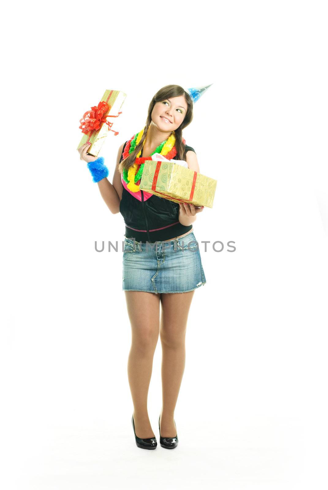 happy young beautiful girl with a present in her hands celebrating her birthday