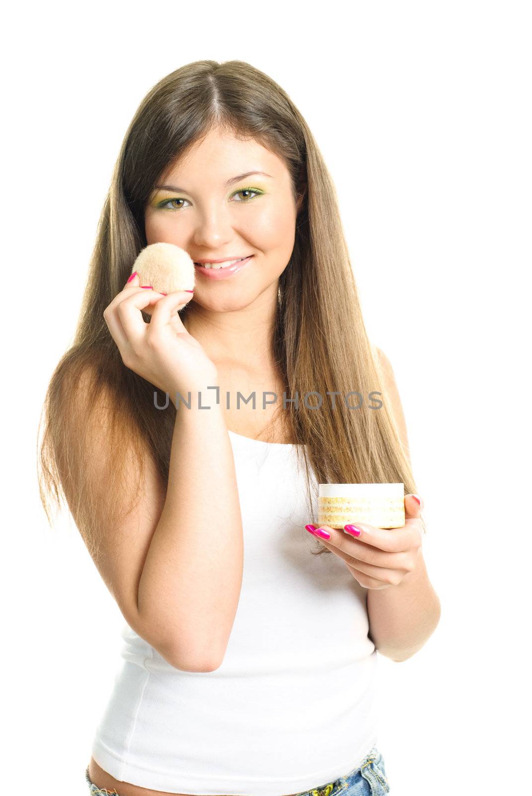 woman applying powder with a sponge by lanak