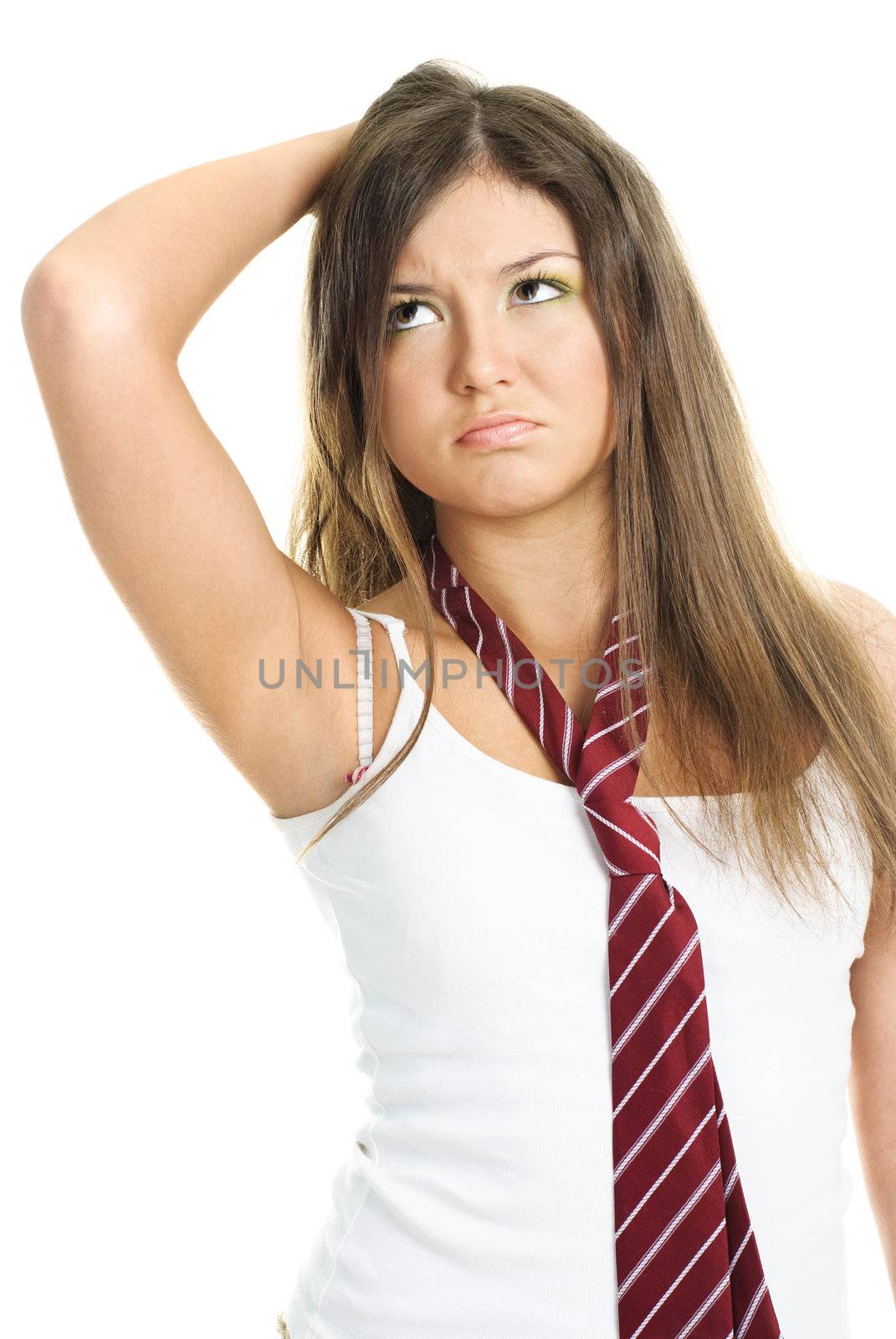 portrait of a beautiful hesitating girl against white background