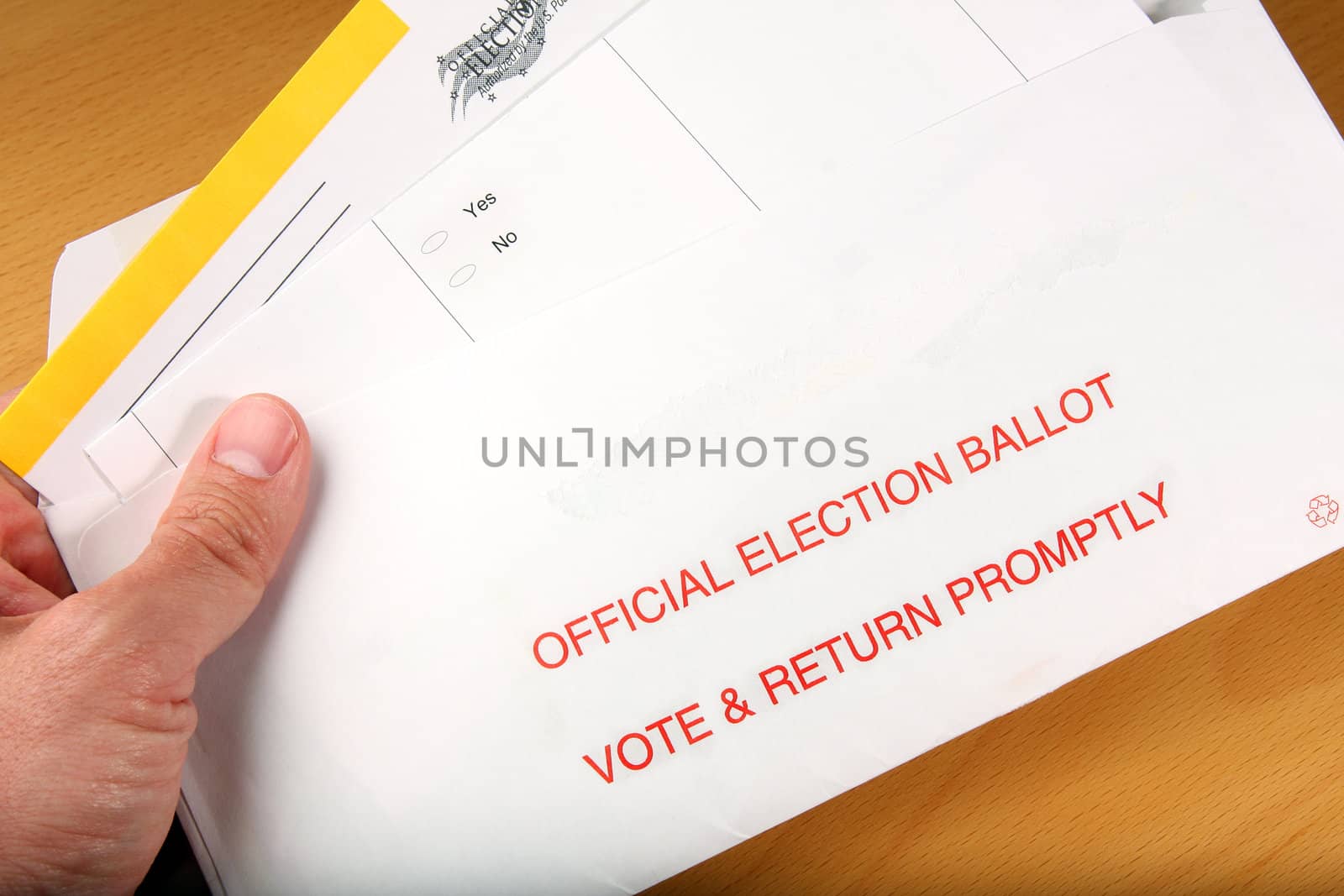 Man open ballot he got in the mail