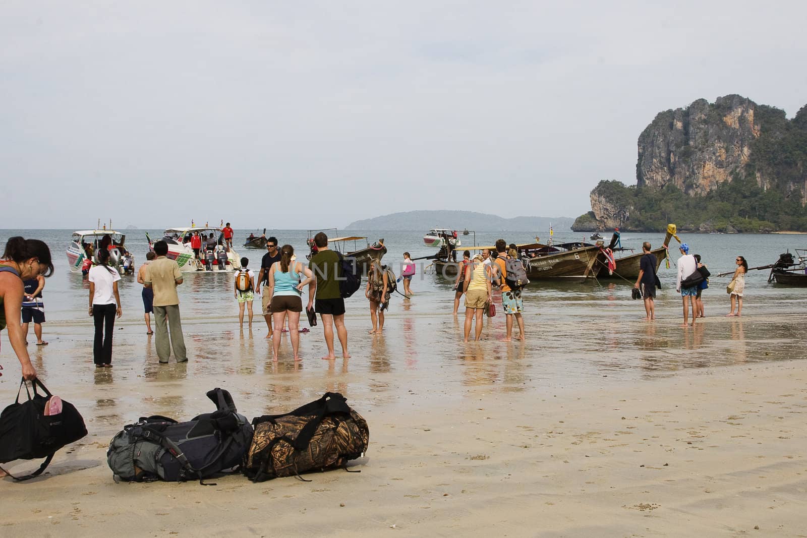 Tourists at Ao Railay beach are going out with the longtail boats to nearby islands. A usual, but special sight on Ao Railay. 