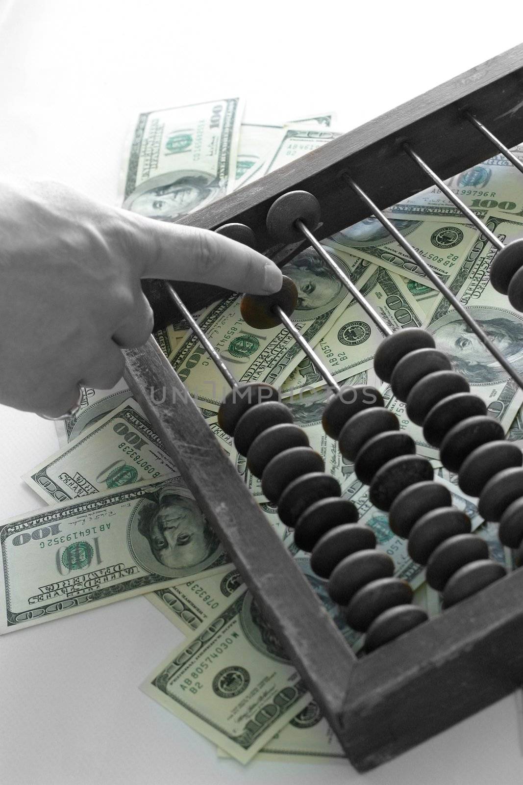 The old tool, a lot of dollars and a man hand