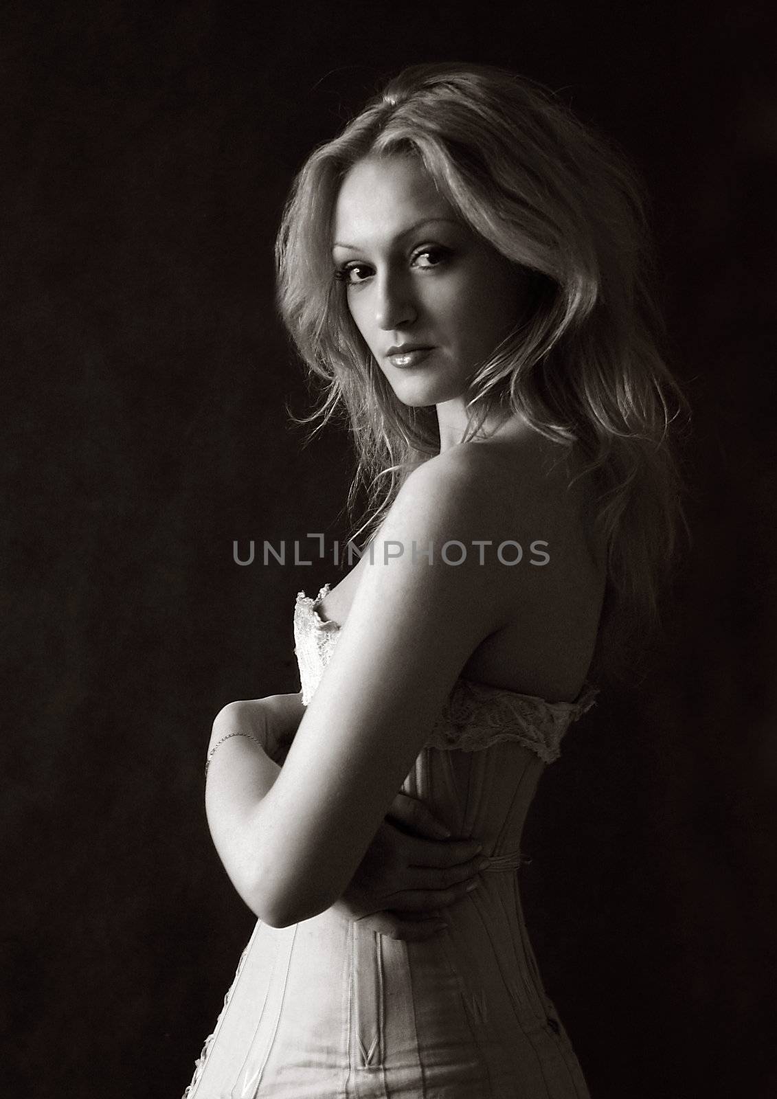 Portrait of the beautiful blonde in studio
