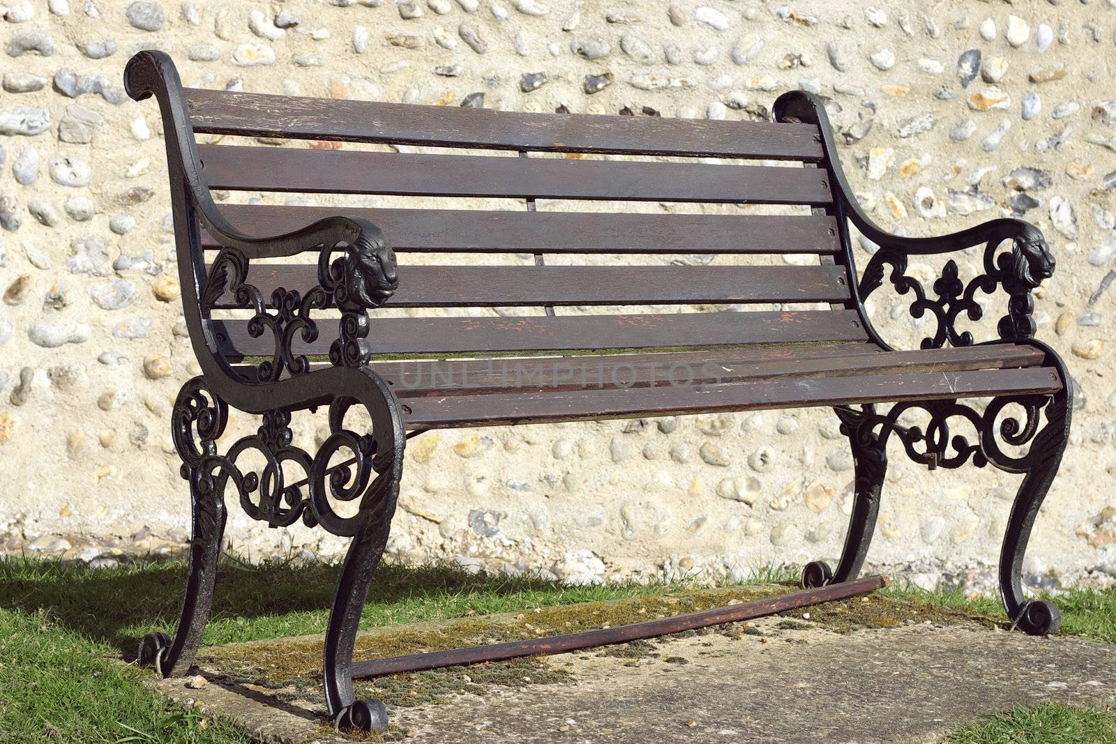old fashioned bench before a church