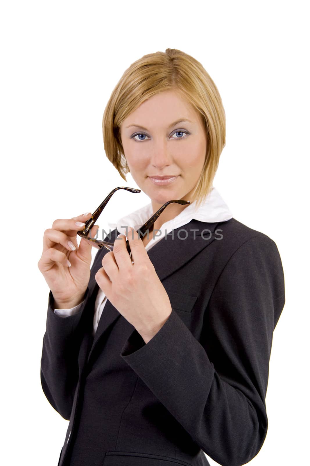 A beutiful blond business woman is holding her glasses