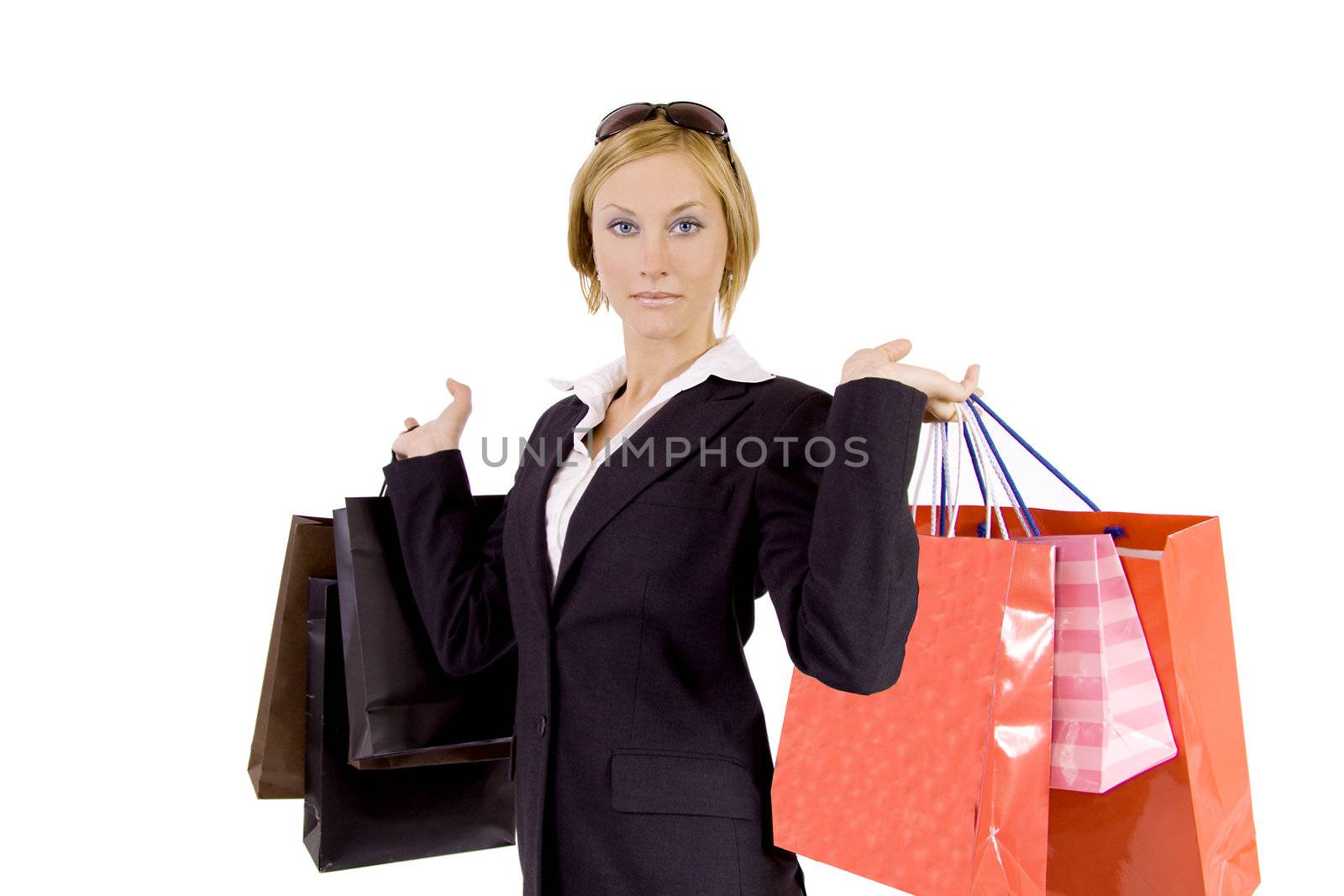 A Swedish blond woman holding a lot of shopping bags