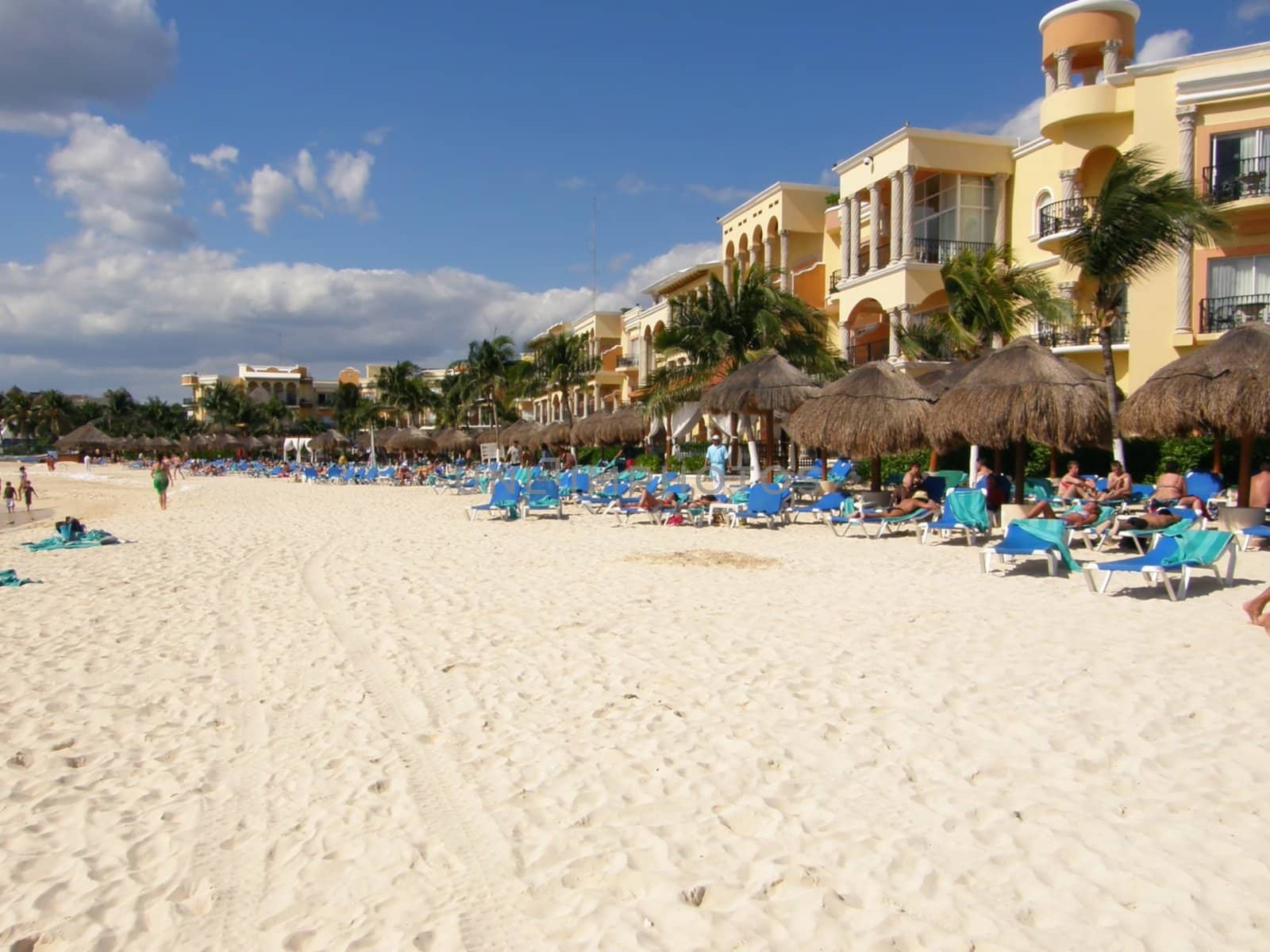 a beautiful white sand beach on a luxurious resort