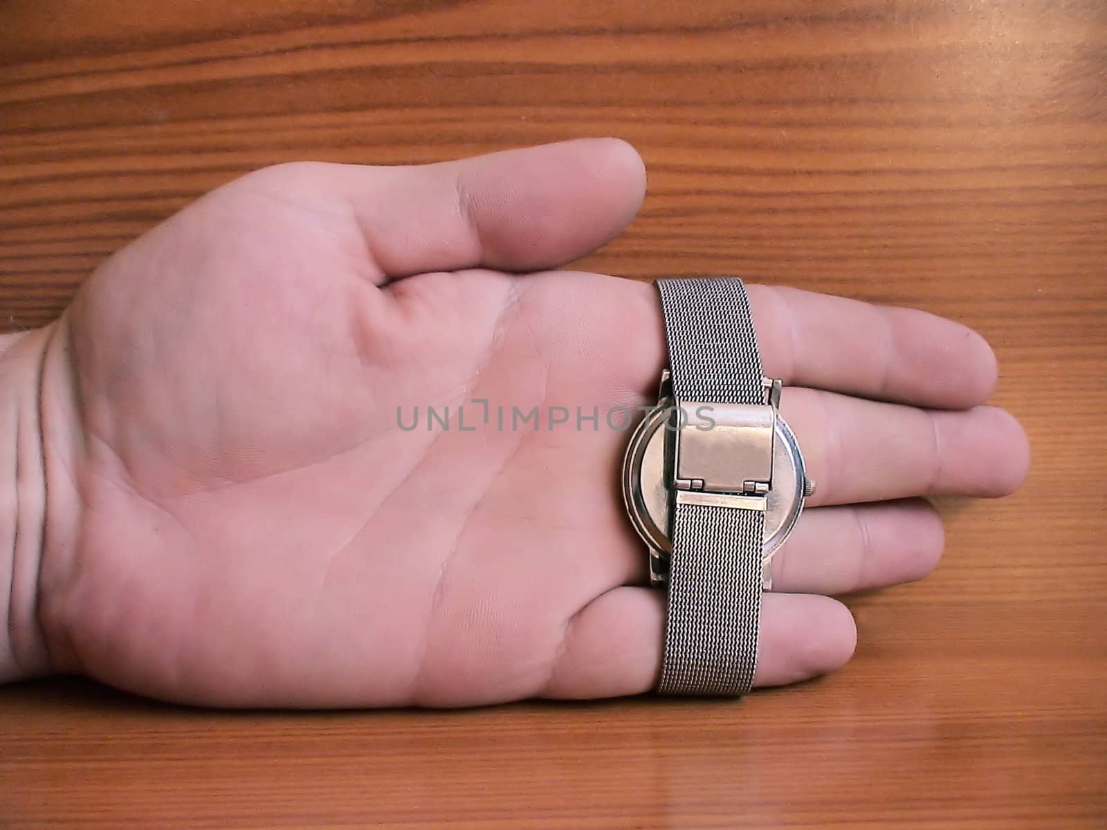 Belt with hours in the opened palm