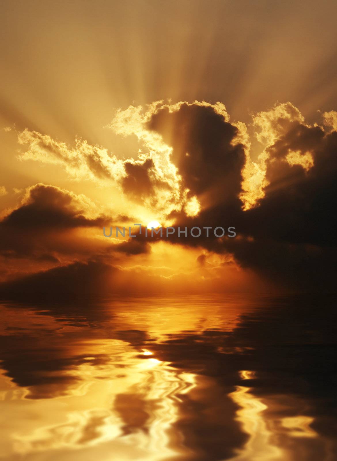 dramatic sundown scene with dark clouds and rays over sea. Good as background, wallpaper.
