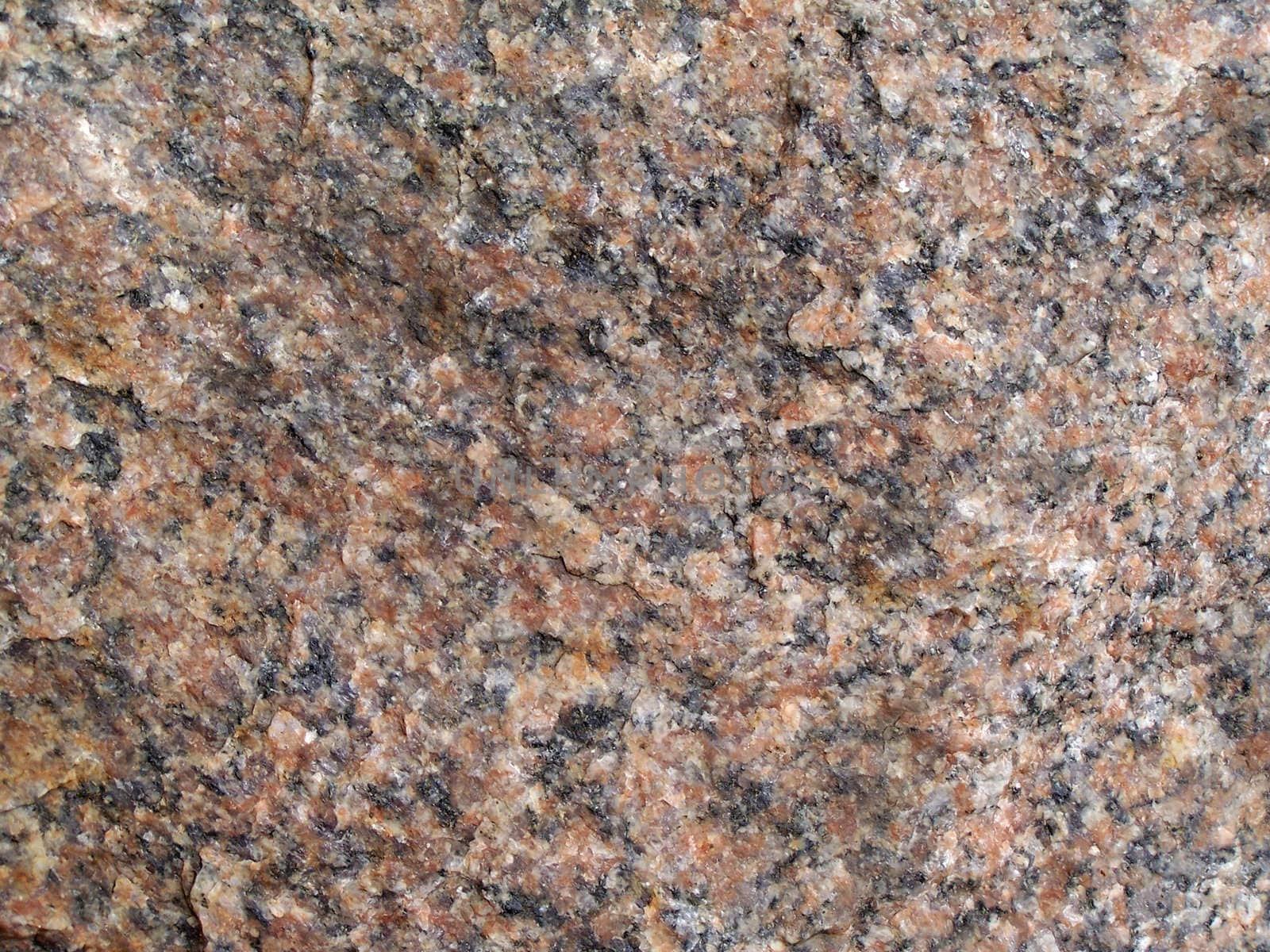 Close up of the surface  of granitic stone.