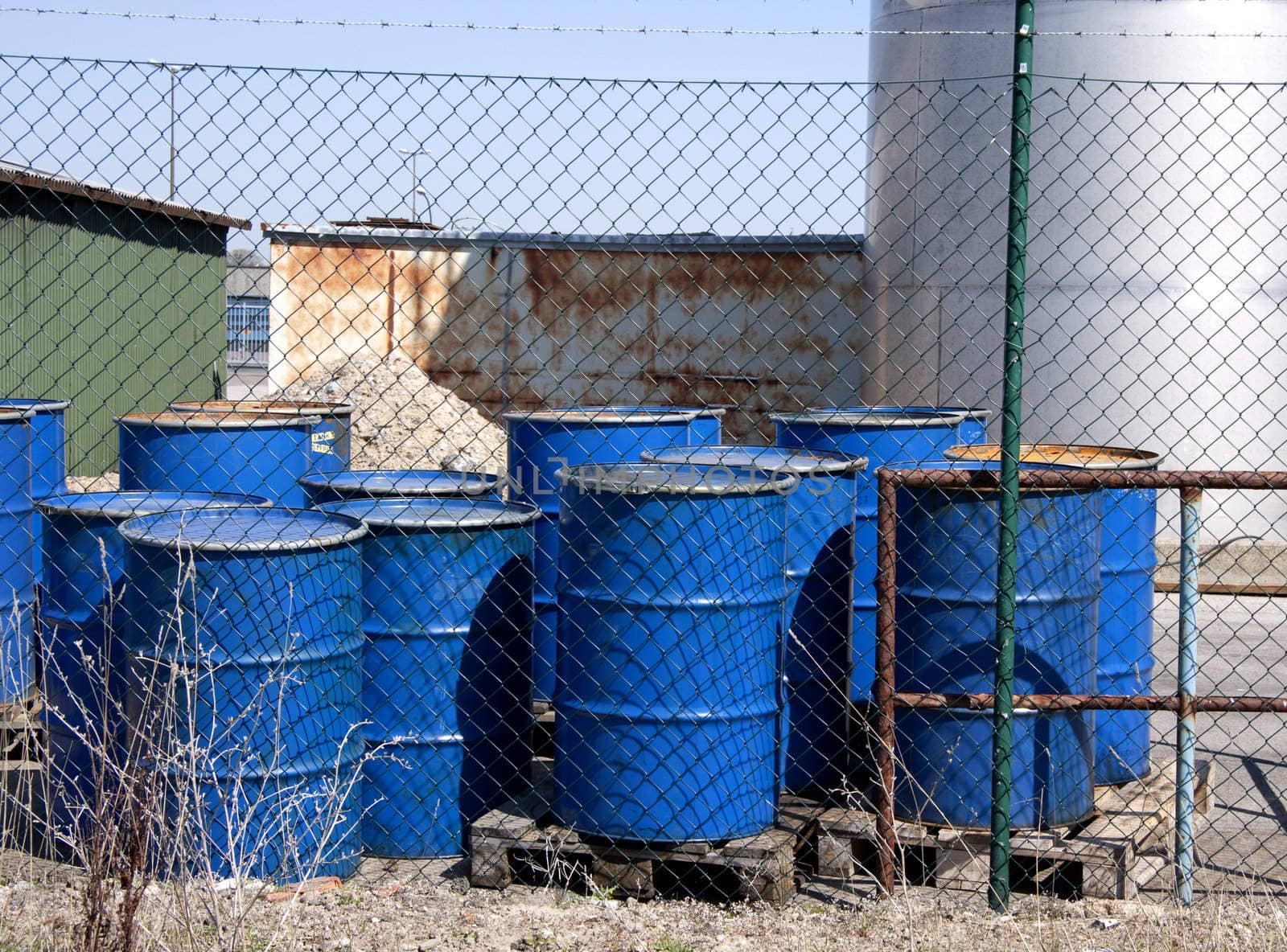 A few blue oil barrels