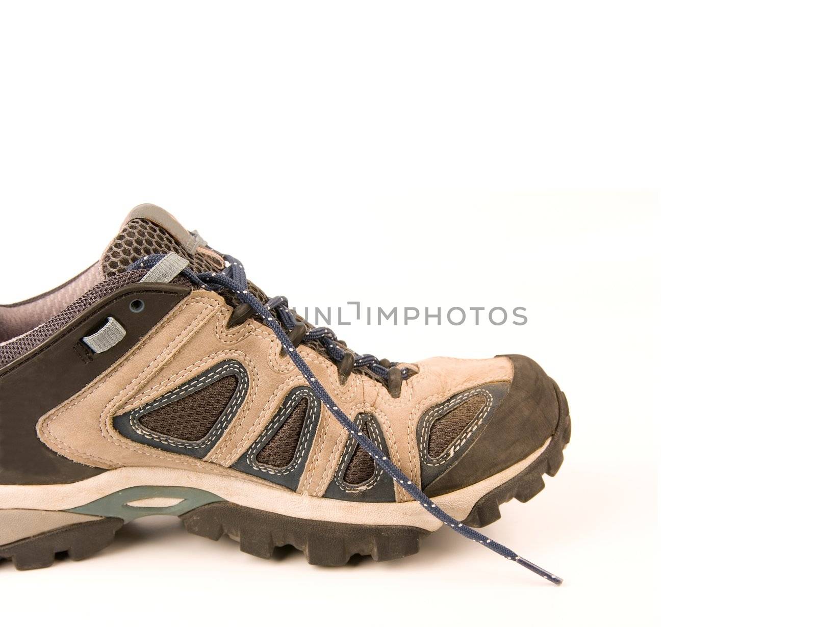 clothes hiking boots or shoes isolated on a withe background made of leather and waterproof and breathable membrane