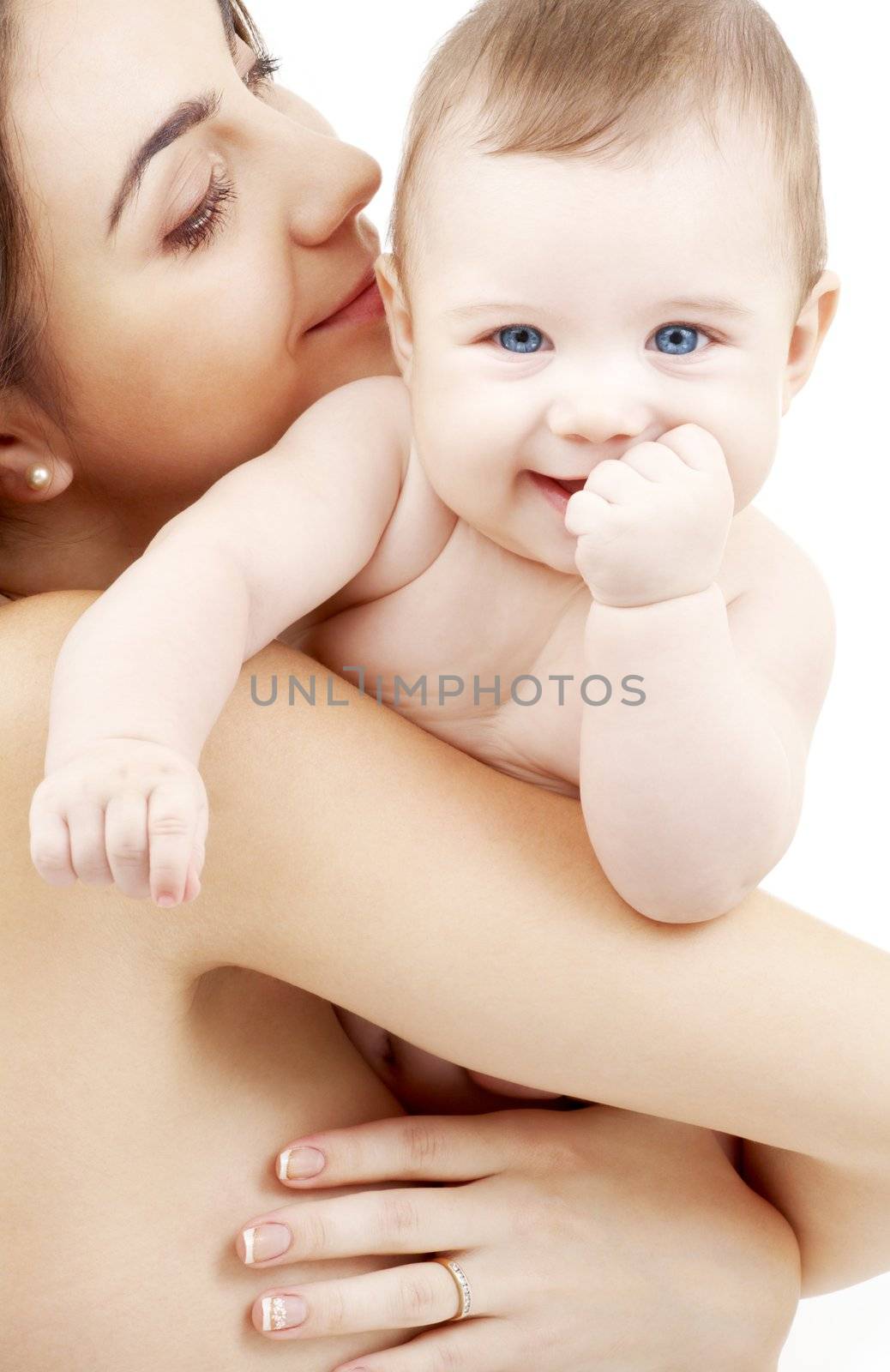 clean happy baby in mother hands by dolgachov